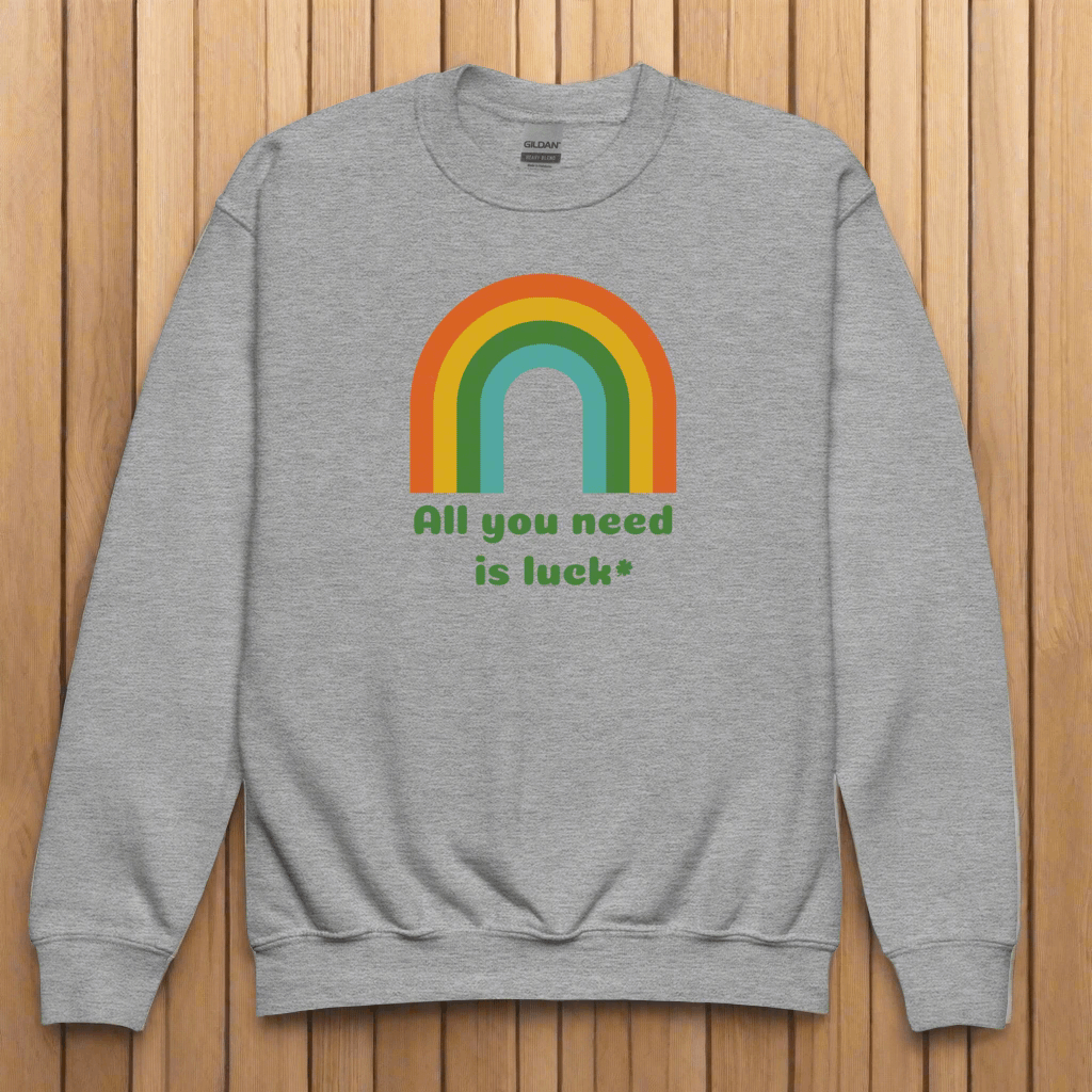Image: All You Need is Luck St Patricks Day Sweatshirt for Toddlers Girls and Tweens. This crewneck pullover features a retro rainbow, the text All You Need is Luck and a four leaf clover. Available in white, black and gray, by jaecrece