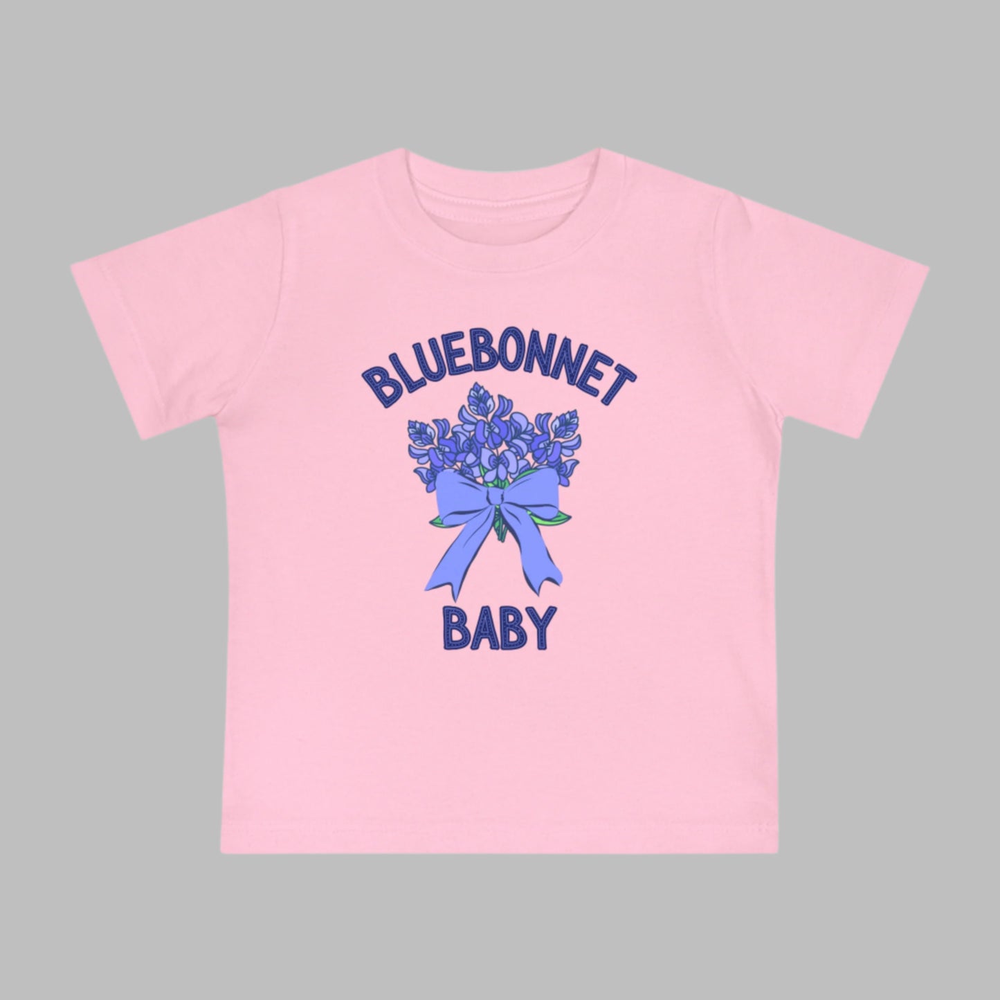 Image: This Texas-inspired baby t-shirt features a beautiful bluebonnet print, perfect for toddlers who love nature. Designed for comfort, it’s great for family outings, spring festivals, or playdates. The lightweight fabric makes it ideal for warm weather, while the charming floral design adds a touch of Texas charm. A thoughtful baby shower or birthday gift, this tee is a great way to introduce little ones to their state’s beloved wildflower, by jaecrece.