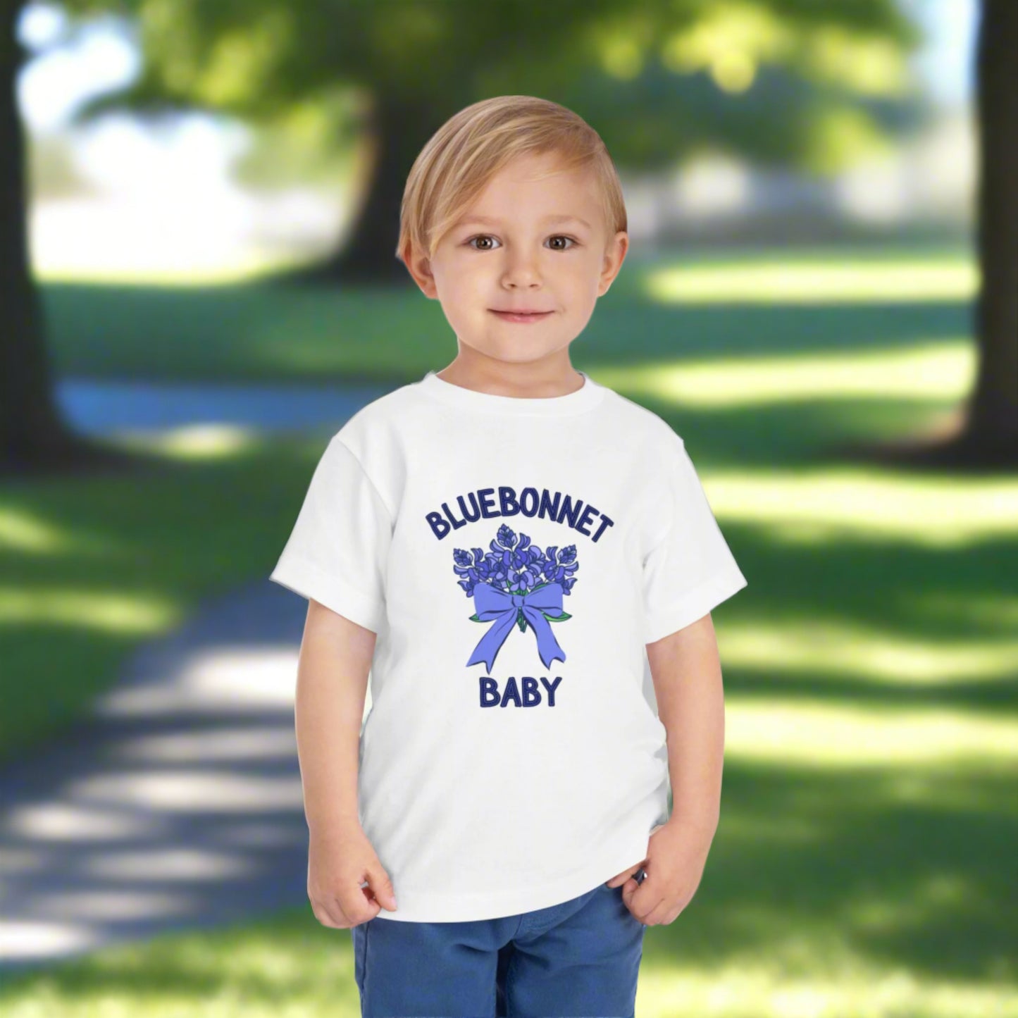 Image: Dress your little one in this Texas wildflower baby tee featuring a delicate bluebonnet design. This lightweight, breathable shirt is ideal for outdoor spring adventures, from bluebonnet field pictures to Easter celebrations. Designed for comfort and style, it makes a great gift for a baby shower, first birthday, or toddler wardrobe upgrade. Celebrate Texas pride and nature’s beauty with this must-have floral t-shirt for kids, by jaecrece.