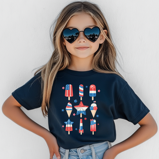 Image: This patriotic popsicle shirt for kids in sizes S to XL features a fun red white and blue design, perfect for celebrating the 4th of July or Memorial Day. With a bright popsicle graphic that kids love, this tee is soft, comfortable, and great for holiday parades or summer picnics. Make it a matching family moment or let your little one show off their American spirit solo, by jaecrece.