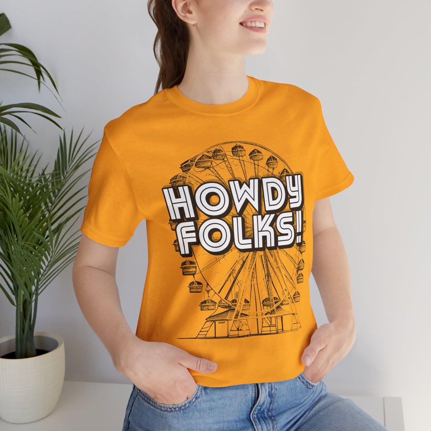 State Fair of TEXAS "Howdy Folks!'  adult shirt. This unisex tee features a retro graphic of a ferris wheel with the words Howdy Folks in large block letters. by jaecrece