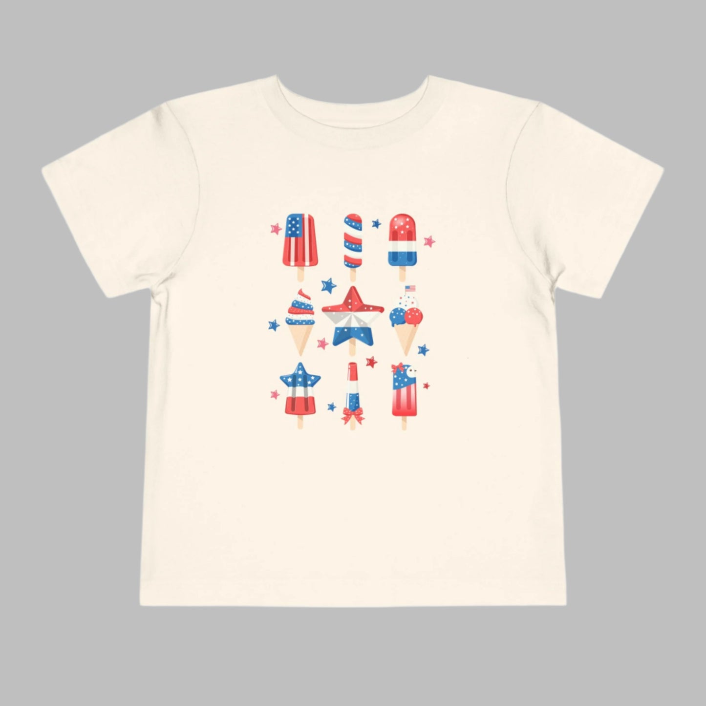 Image: Fun and festive toddler t shirt for Fourth of July with a popsicle that blends red white and blue for a refreshing patriotic look. Whether you’re enjoying fireworks or snapping holiday family photos, this toddler tee is a stylish and sweet way to celebrate American pride. Pair with shorts for an easy outfit or match with siblings for maximum fun, by jaecrece.