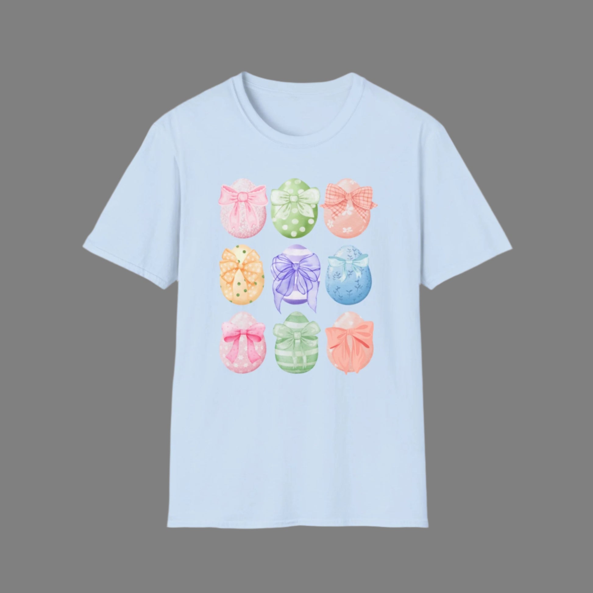 Image: Easter egg tshirt with coquette bows for women. This tee makes a great Easter basket gift, or the perfect outfit for Easter celebrations, by jaecrece