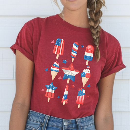 Image: Show off your American spirit in this patriotic popsicle shirt for adults, available in sizes XS to 5XL. Featuring red white and blue colors with a fun frozen treat graphic, it is the perfect tee for 4th of July parties, barbecues, or Memorial Day parades. This festive top is soft, comfortable, and stylish, making it ideal for anyone who wants to celebrate freedom and summer fun in one outfit, by jaecrece.