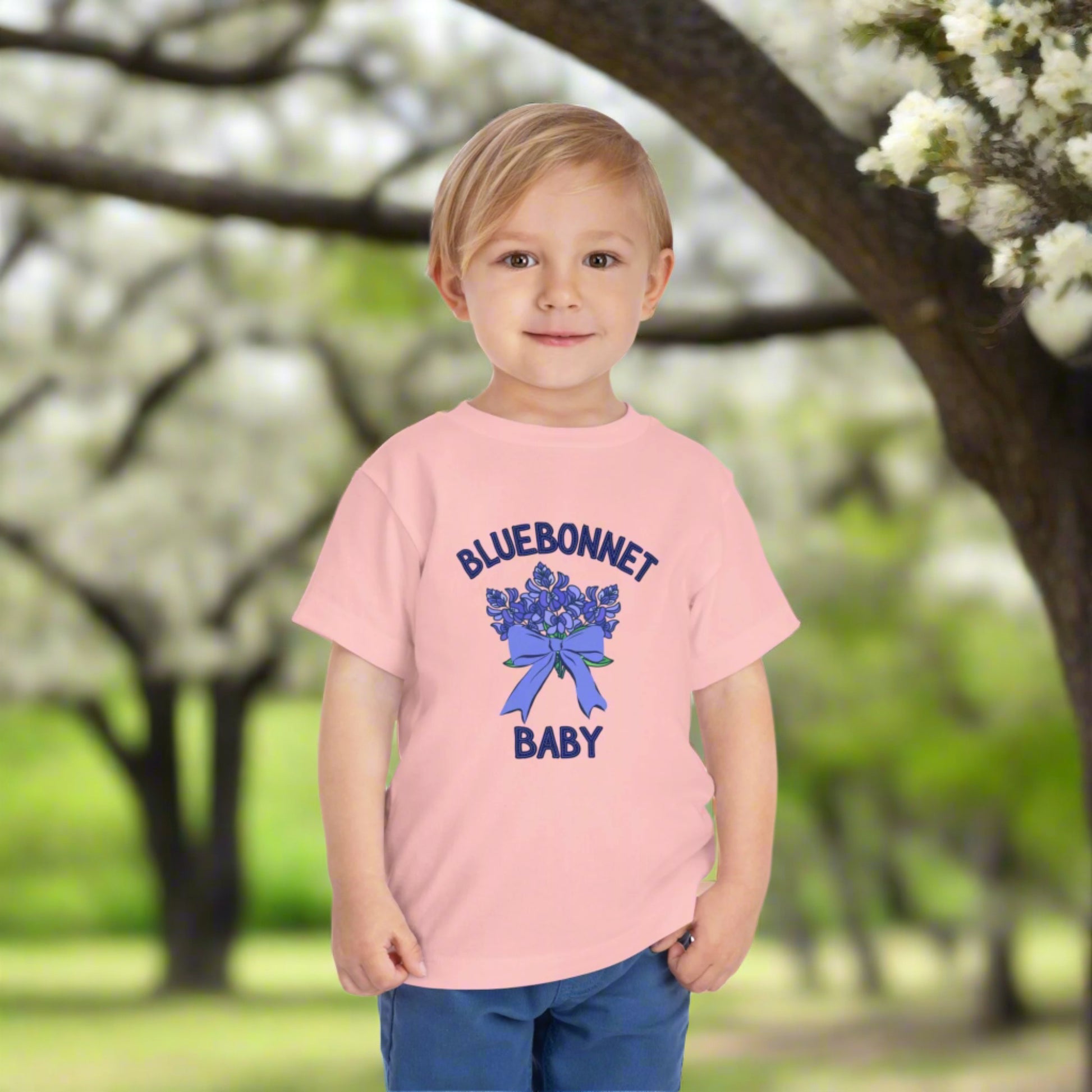 Image: Dress your little one in this Texas wildflower baby tee featuring a delicate bluebonnet design. This lightweight, breathable shirt is ideal for outdoor spring adventures, from bluebonnet field pictures to Easter celebrations. Designed for comfort and style, it makes a great gift for a baby shower, first birthday, or toddler wardrobe upgrade. Celebrate Texas pride and nature’s beauty with this must-have floral t-shirt for kids, by jaecrece.