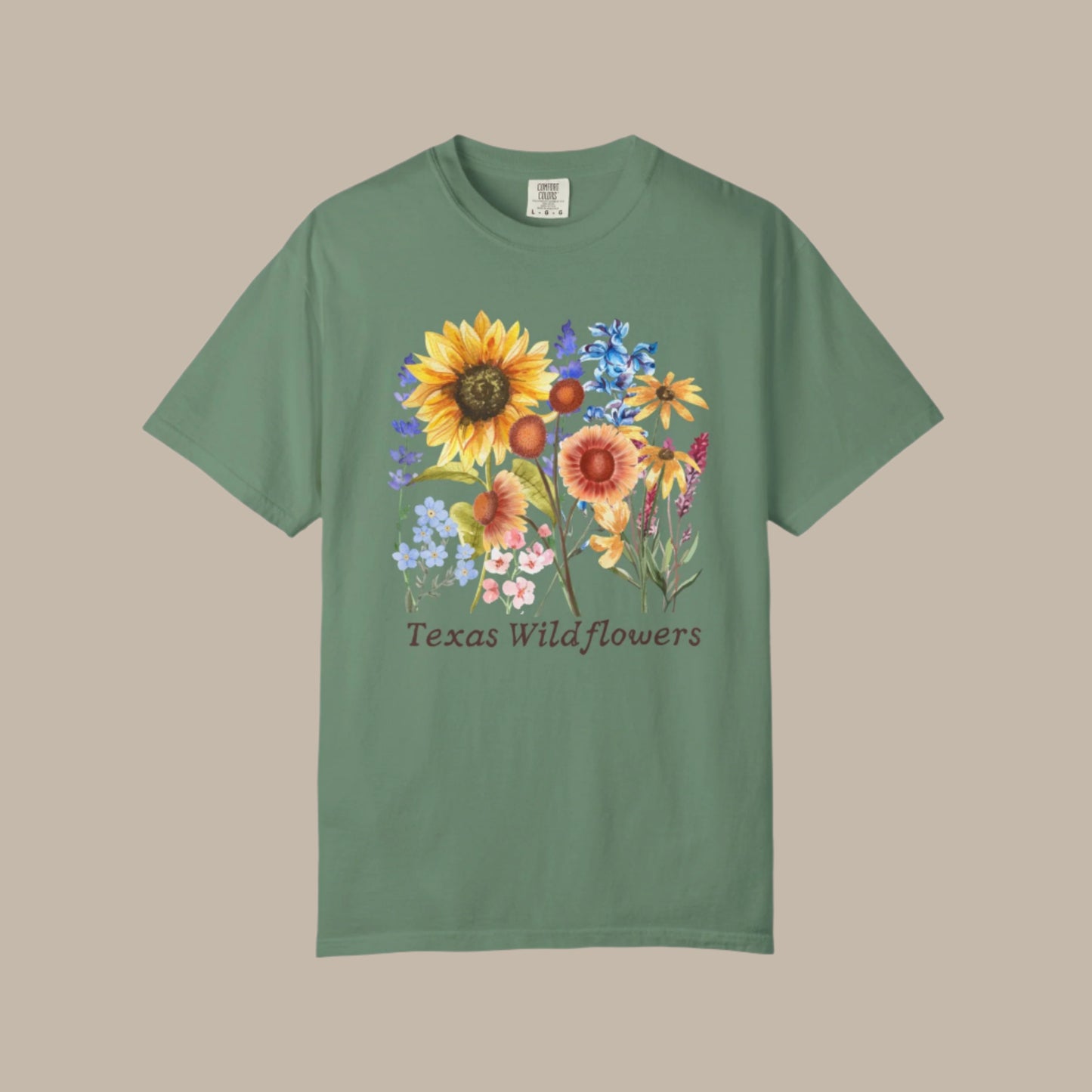 Texas wildflower tee in Comfort Colors style with bluebonnet graphics and a pastel floral print. This soft girl, Southern-style shirt celebrates spring blooms and Texas pride. A beautiful gift for nature lovers or festivalgoers, it’s breathable, comfy, and perfect for casual looks inspired by wildflower drives and spring landscapes.
