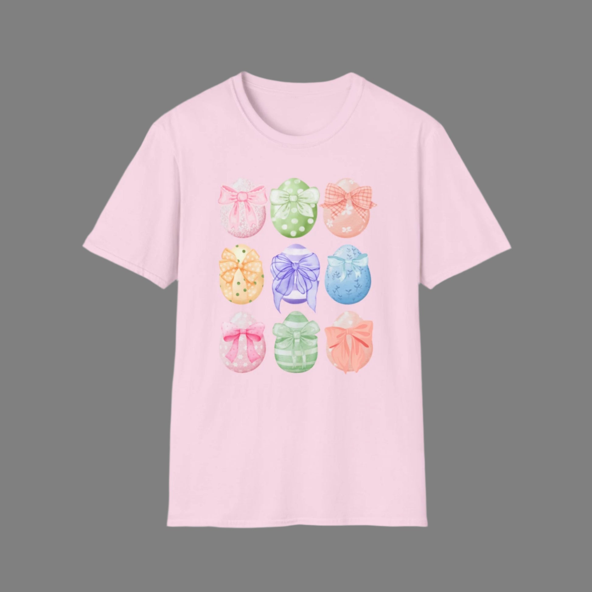 Image: Easter egg tshirt with coquette bows for women. This tee makes a great Easter basket gift, or the perfect outfit for Easter celebrations, by jaecrece