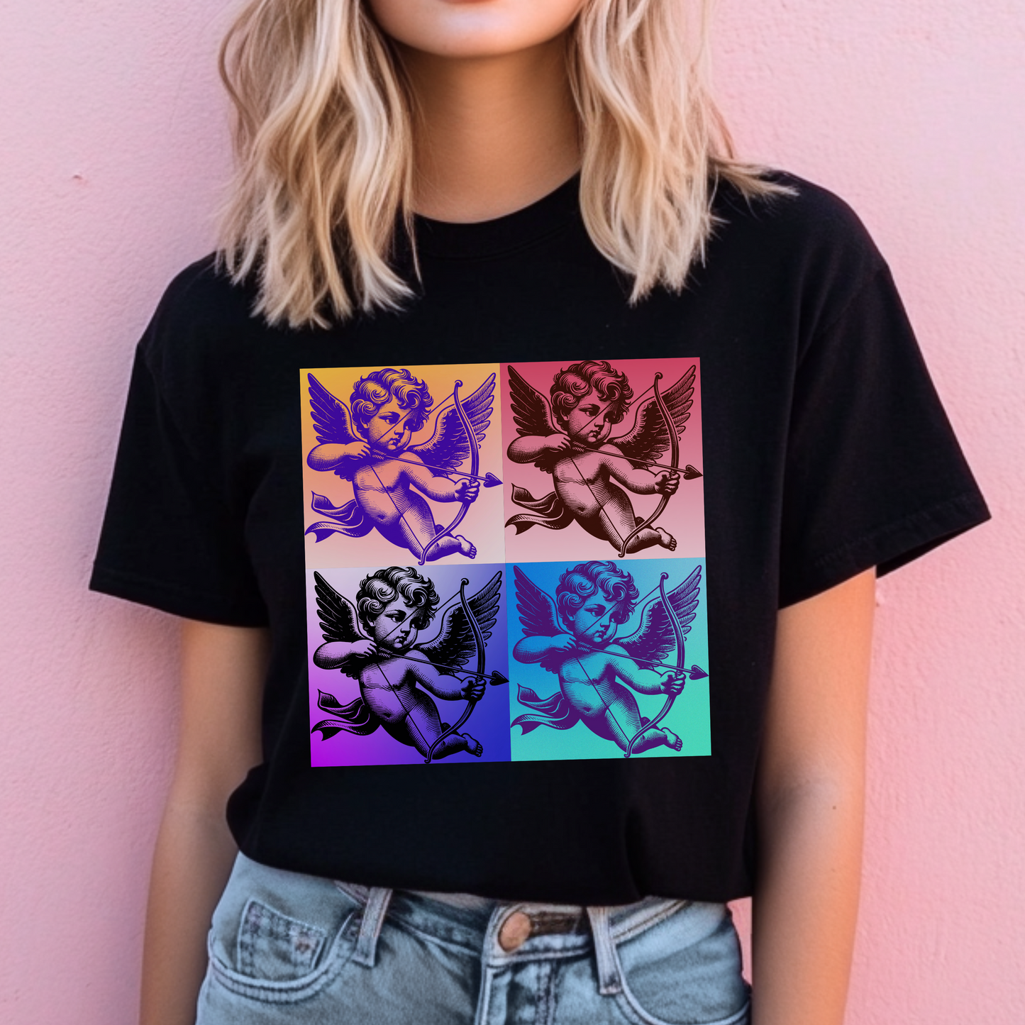 This adult Pop Art Cupid tee features a nostalgic vintage graphic and is available in sizes XS through 5XL. A soft and lightweight Bella Canvas shirt in black, white, or pink, it's perfect for Valentine’s Day celebrations, gifts, or matching family photos. Pair with matching toddler and youth sizes for a coordinated Valentine-core look, ideal for parents, caregivers, and soft girl fashion fans.