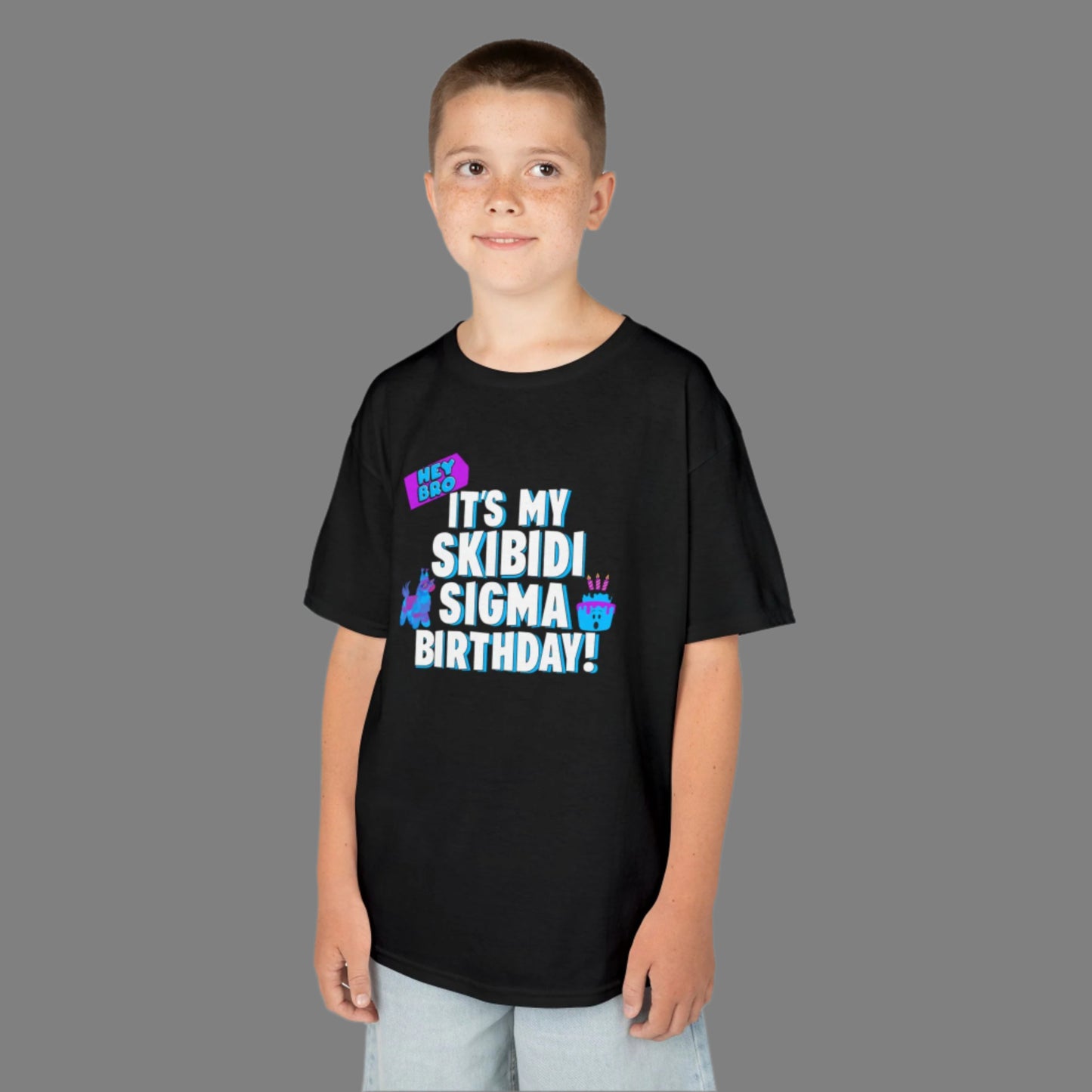 Make your gamer kid’s birthday unforgettable with this “Hey Bro! It’s my Skibidi Sigma Birthday!” shirt, perfect for boys, girls, and tweens who love trending memes. This shirt blends viral Skibidi humor with Sigma bro attitude. Available in Navy, White, Black, and Sport Grey, it’s a fun birthday outfit choice for school, parties, or gaming celebrations for meme-loving kids.