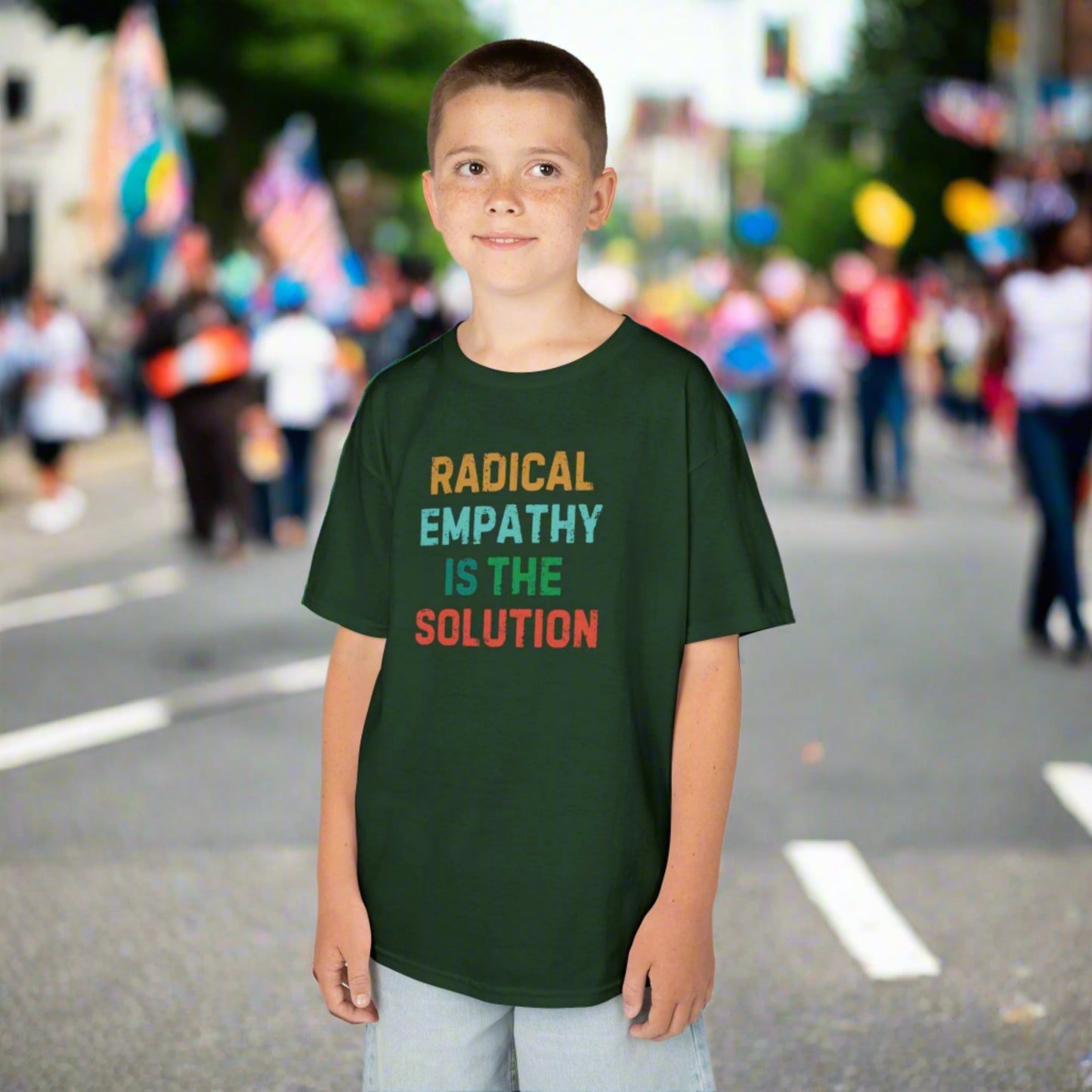 Image: A soft, comfortable kids' tee featuring the words "Radical Empathy is the Solution" in a bold, empowering design. Ideal for young activists, this shirt encourages kindness, understanding, and inclusivity. Whether for school, social events, or casual wear, this t-shirt helps kids express their values while staying stylish and comfortable, by jaecrece.