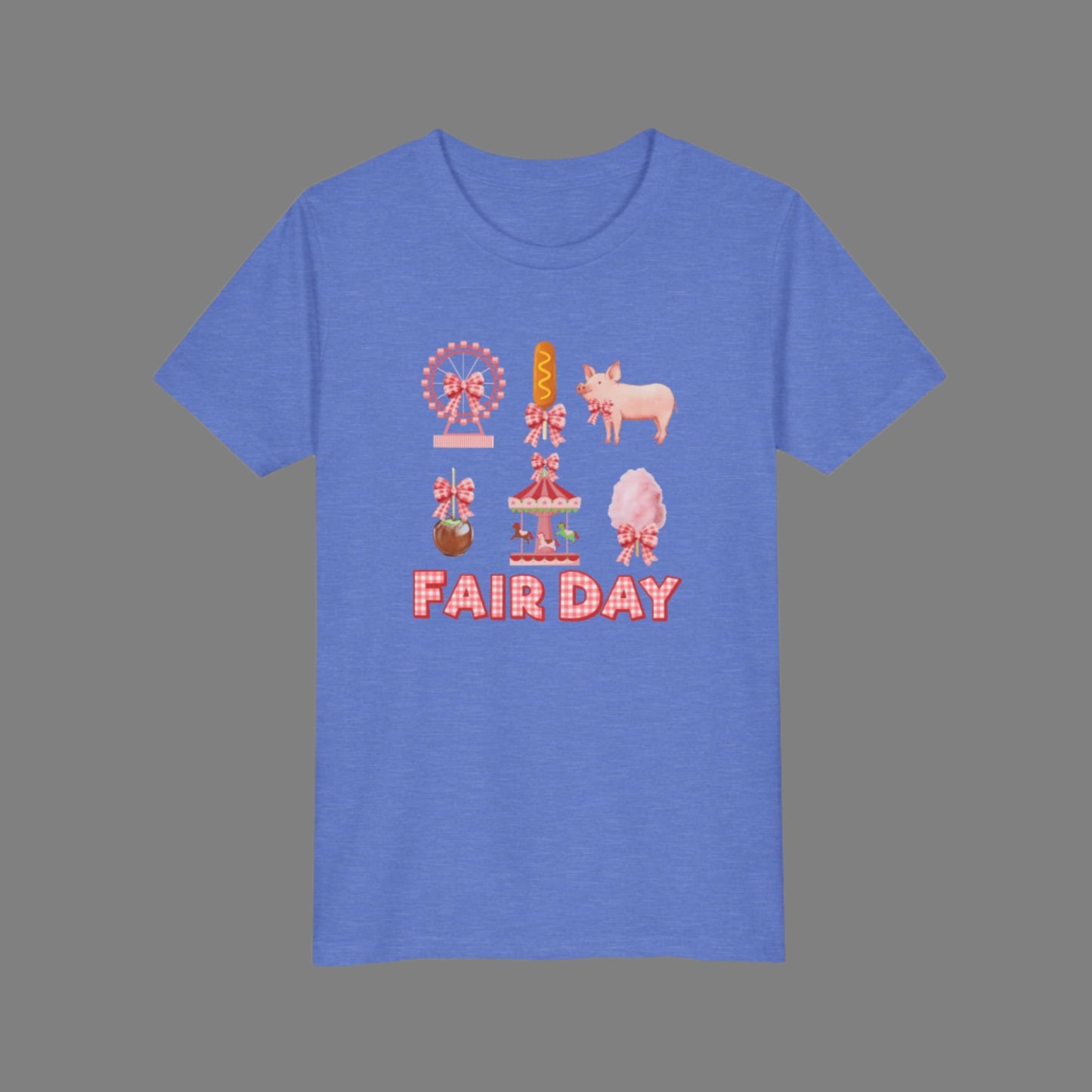 Image: A playful Fair Day graphic tee with red and white gingham lettering, designed for fair lovers of all ages. Featuring a collage of fair inspired images including a pig, Ferris wheel, caramel apple, and corndog, this shirt brings the fun of the fair to life. Designed with a soft girl coquette look, it is perfect for family matching outfits at the state fair, livestock shows, or carnival themed birthday parties, available in toddler, girl, and women’s sizes, by jaecrece.