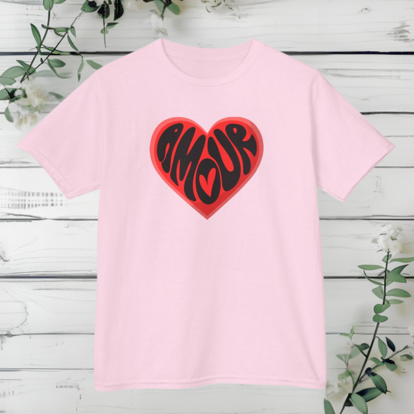 Celebrate Valentine’s Day with French flair in the Amour Love Girls T-shirt. Featuring the word “Amour” inside a heart graphic, this stylish tee fits sizes XS–XL and is perfect for girls who love coquette fashion and Parisian style. A great Valentine’s gift for your daughter or for mommy and me matching outfits, this shirt is ideal for school parties, Galentine’s, or everyday casual looks with a pop of pink love.