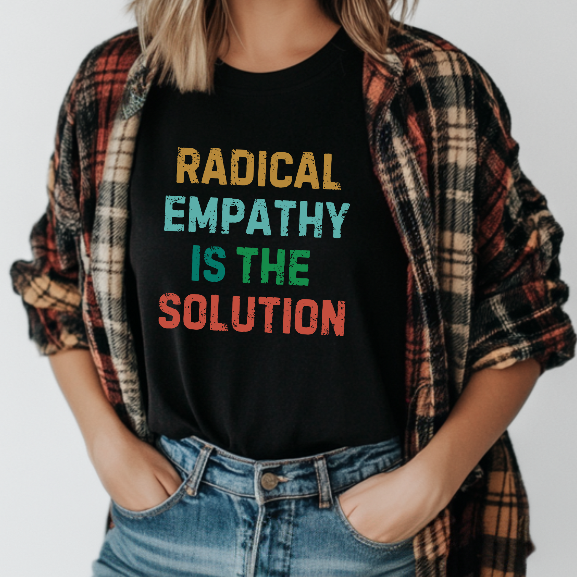 Image: Let your shirt do the talking with this "Radical Empathy is the Solution" tee, designed for those who refuse to tolerate hate. A perfect pick for feminists, leftists, and neurodiversity advocates, this statement tee is both stylish and meaningful. Whether you're attending a protest or just sparking conversations, this activist shirt is a great gift for those who believe in a better world, by jaecrece.