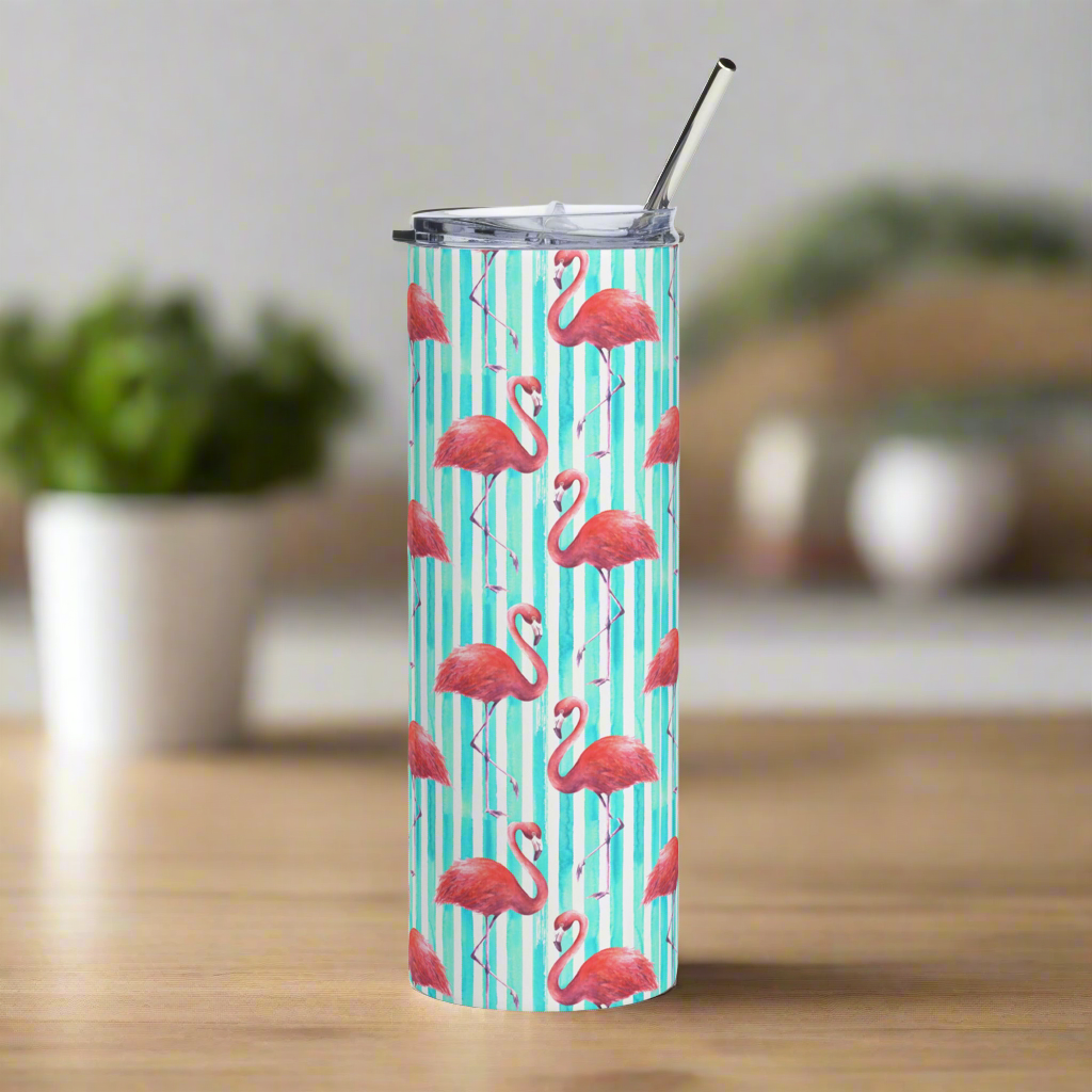 20 oz flamingo stainless steel tumbler for summer fun, featuring a playful tropical print and reusable straw. Great for cold brew, iced coffee, and lemonade at the beach or pool. This insulated flamingo drink tumbler is perfect for gifting, travel, and daily use. Ideal for women who love bold, colorful designs and tropical accessories. Durable drinkware for hot and cold drinks