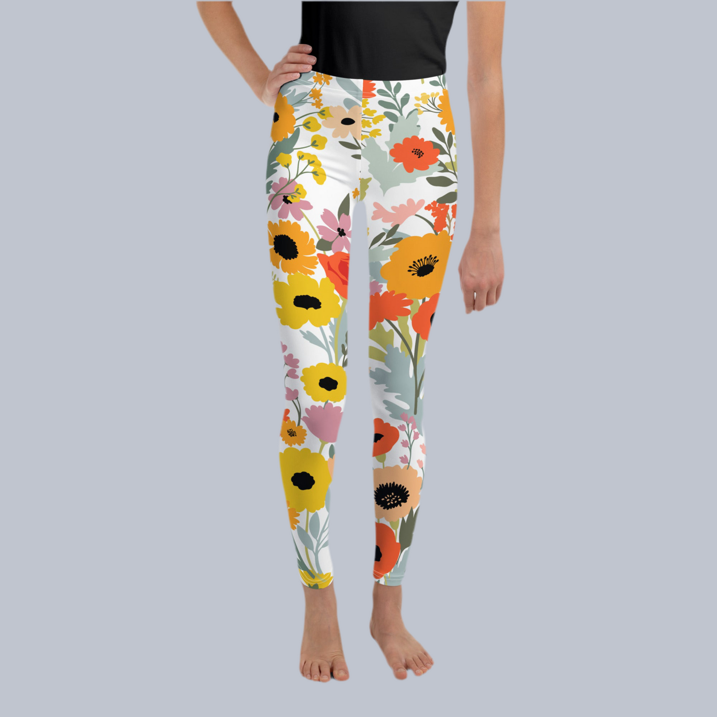 Image: These watercolor wildflower leggings for girls, tweens, and teens in sizes 8–20 are bursting with springtime charm. Designed with a detailed floral print and cozy fit, they’re perfect for active kids who love style and comfort. Pair them with coordinating toddler or mom leggings for a complete family matching look during seasonal events like spring break or Mother's Day, by jaecrece.