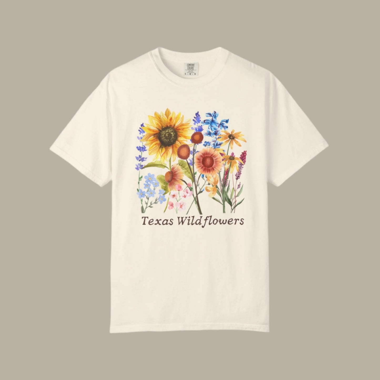Wildflower Comfort Colors t-shirt for spring, printed with pastel bluebonnets and Indian paintbrush. A soft girl aesthetic design perfect for Southern mamas, nature lovers, or Texas road trippers. Lightweight and comfy, this vintage-inspired floral shirt is ideal for flower festivals, Hill Country adventures, or gifting your favorite Texas native with a love for blooms.