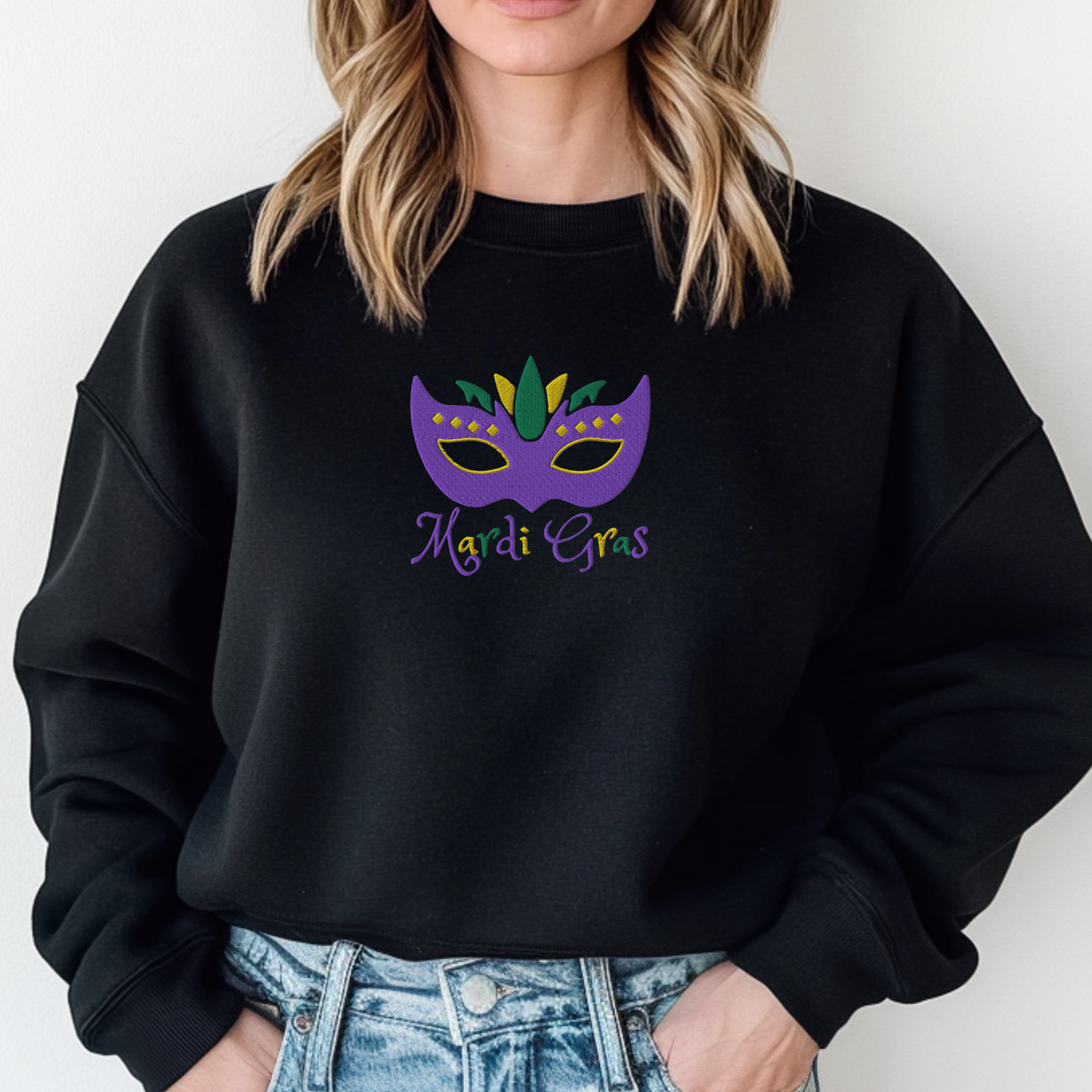 This adult Mardi Gras sweatshirt brings the celebration to life with a colorful embroidered Carnival mask and classic “Mardi Gras” script. Perfect for New Orleans street parties, French Quarter festivities, or cozying up at home in festive style, this sweatshirt (S–5XL) is part of a matching family look that’s ideal for NOLA fashion and Louisiana parade lovers.