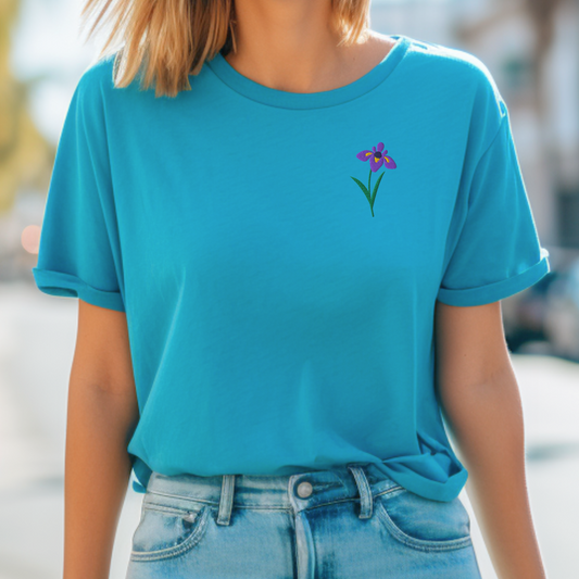 Image: A delicate embroidered iris crewneck sweatshirt, perfect for spring and beyond. This floral-themed pullover features a timeless flower embroidery design, making it a perfect birthday, holiday, or Mother’s Day gift. Whether styled casually or layered for a chic look, this sweater is a must-have for those who love feminine florals and elegant nature-inspired fashion, by jaecrece.