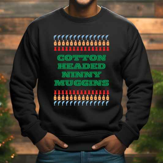 Unisex Cotton Headed Ninny Muggins sweatshirt inspired by the Elf movie, shown in a cozy holiday setting. This funny Christmas sweatshirt features a classic fit and soft cotton-poly blend, perfect for fans of holiday humor and festive loungewear. Great for movie lovers, Secret Santa gifts, or matching family Christmas outfits. Designed for comfort, style, and a joyful pop culture twist.