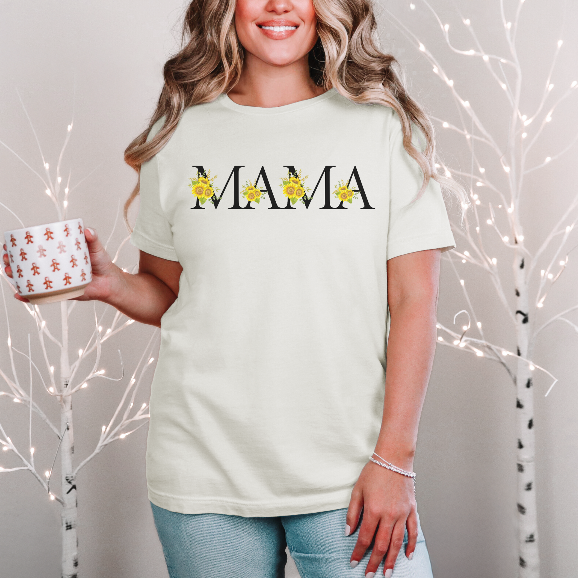 Sunflower Mama shirt with cheerful floral accents on each letter of the bold black “Mama” design. A thoughtful gift idea for plant-loving moms, sunflower fans, or women who enjoy nature-inspired fashion. Lightweight, comfortable, and versatile—perfect for spring and summer outfits. A great way for moms to feel seen and celebrated with a stylish twist.