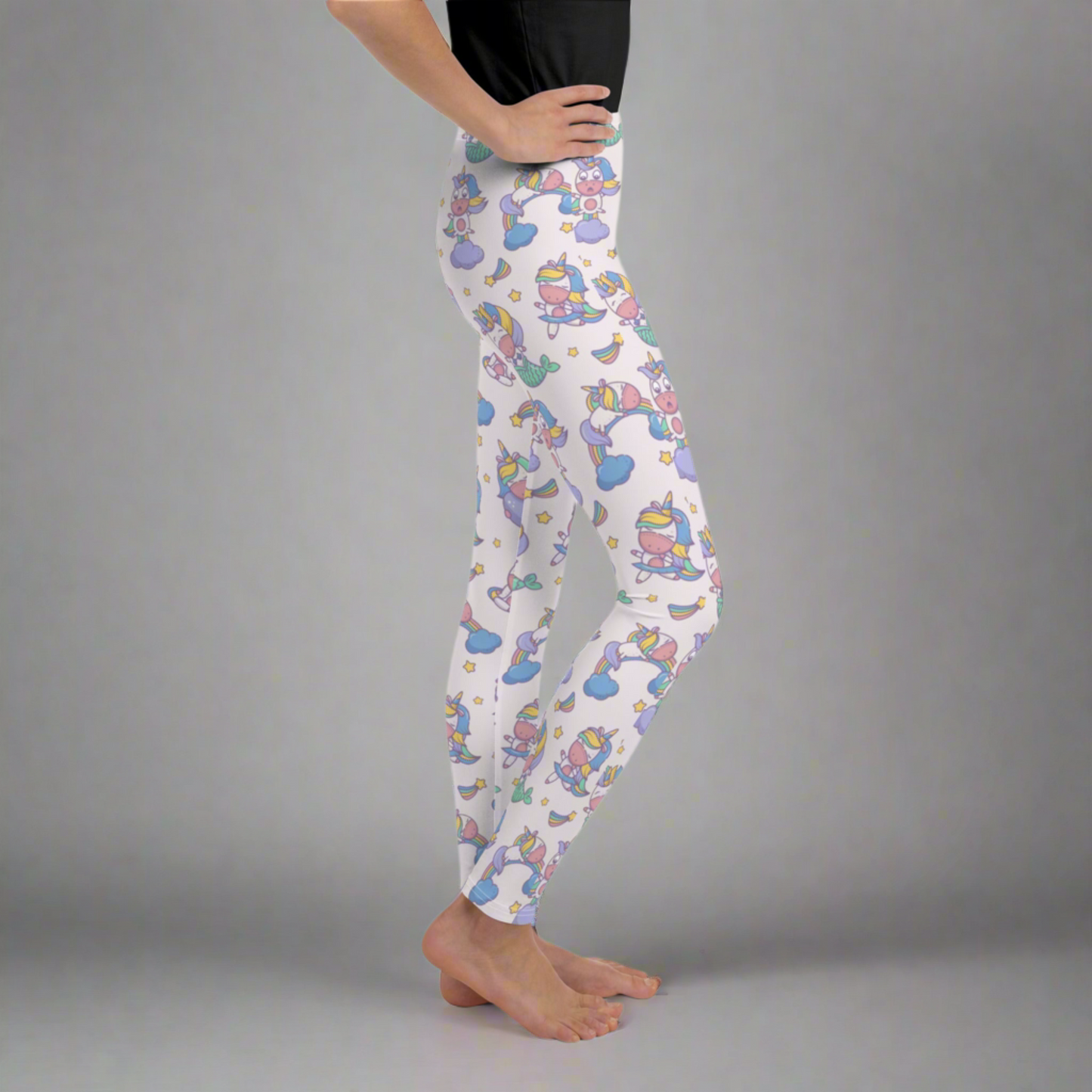 Image: Unicorn Mermaid Kawaii Girls Leggings. These pastel pink yoga pants feature a cute pattern graphic of Unicorn mermaids, stars and rainbows. The perfect birthday present, Christmas gift, school outfit for toddlers, tweens and teens, by jaecrece