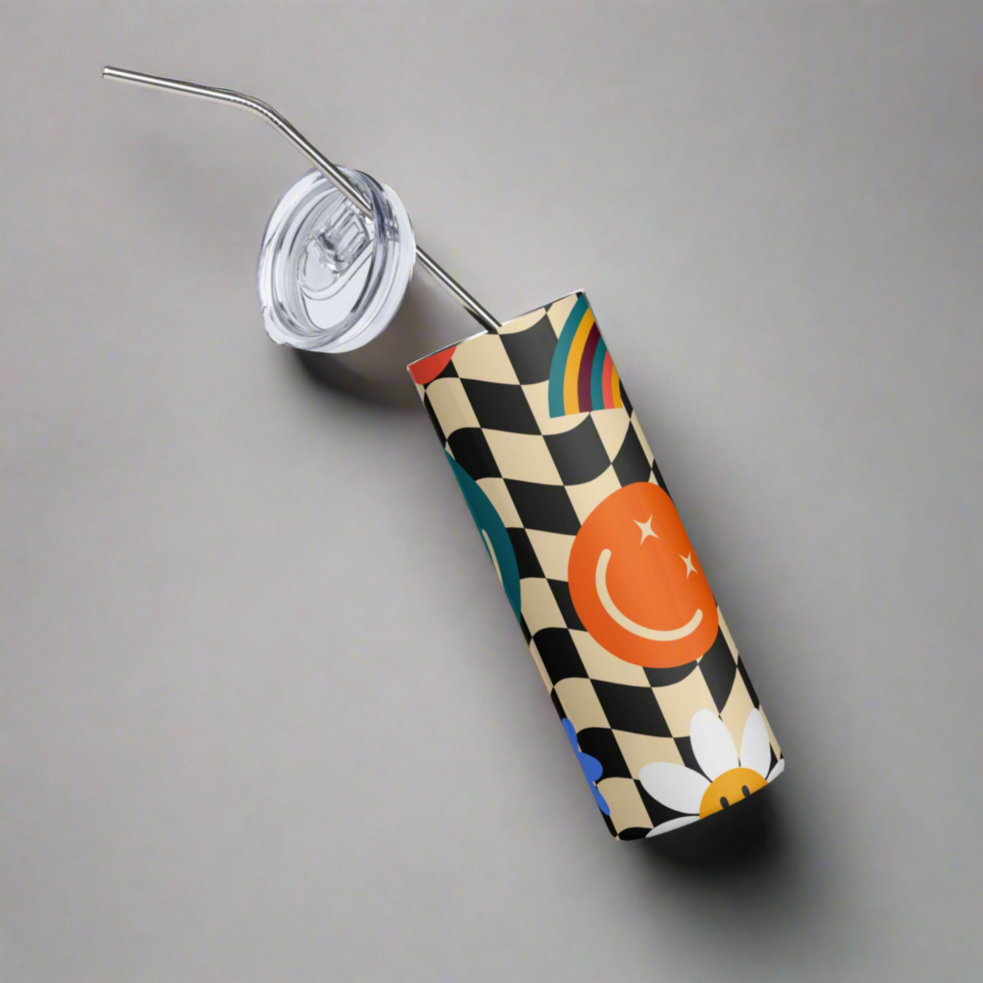 Smiley Face Checkerboard 20 oz Stainless Steel Tumbler, created with a fun black and tan checker pattern with rainbows, smiley faces and daisies, by jaecrece.com