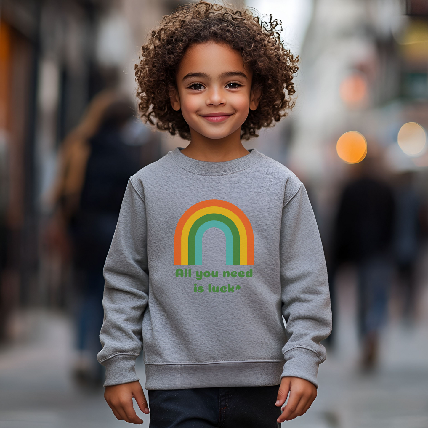Image: All You Need is Luck St Patricks Day Sweatshirt for Toddlers Girls and Tweens. This crewneck pullover features a retro rainbow, the text All You Need is Luck and a four leaf clover. Available in white, black and gray, by jaecrece