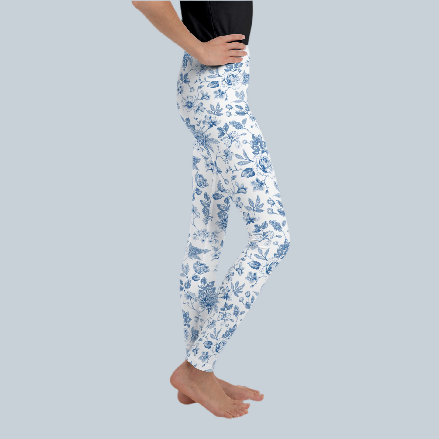 Image: Blue Toile Leggings for tweens and teens offer a vintage French-inspired design with soft fabric and stretch fit. Youth sizes 8 to 20 make them perfect for older kids who want unique fashion that stands out. These toile print leggings are part of a matching family collection, ideal for coordinated outfits, family portraits, and holiday celebrations, by jaecrece.