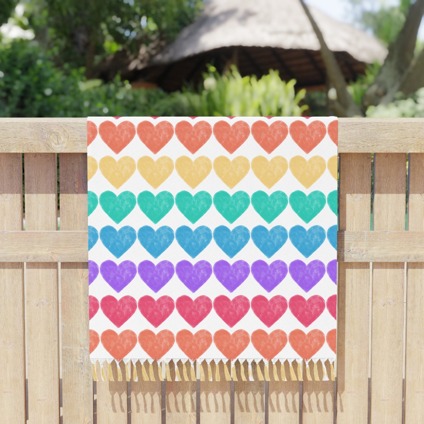 Image: The Rainbow Hearts Beach Cloth exudes happiness and love. It features a repeating pattern of rainbow hearts with fringe tassels. It makes a great lgbtq gay wedding gift, by jaecrece