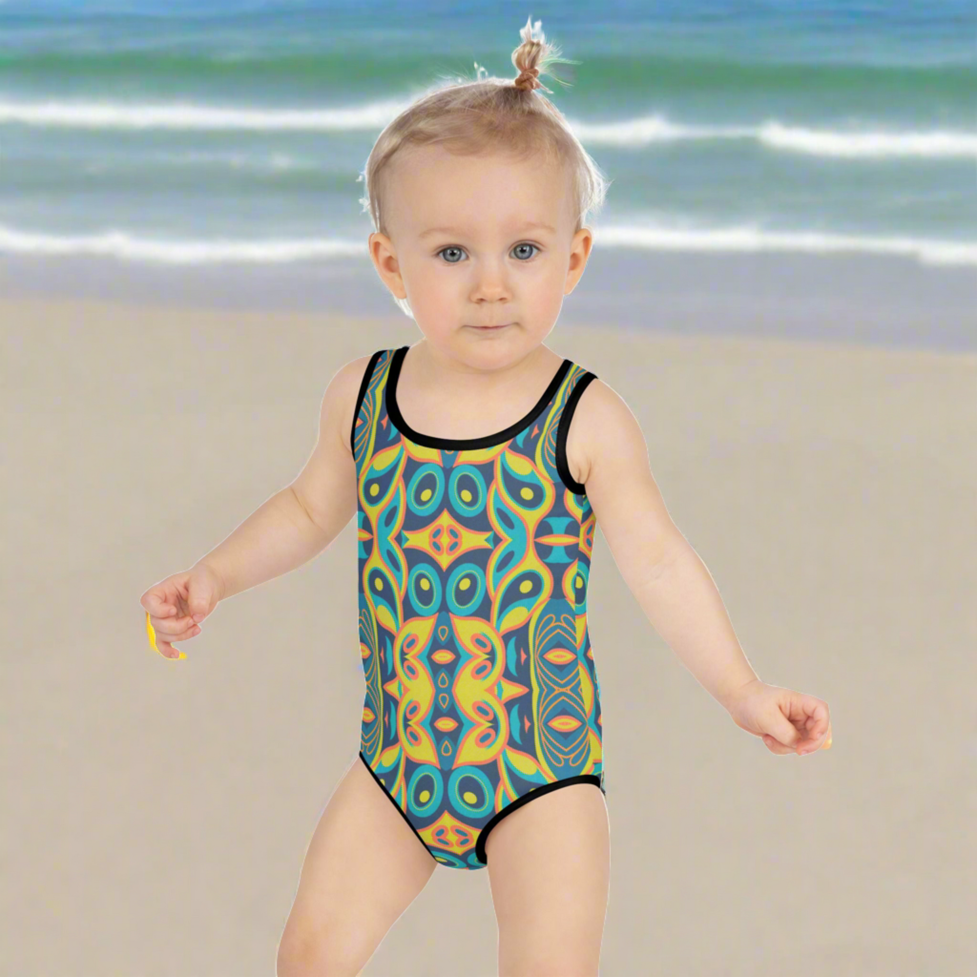 This retro toddler swimsuit in a bold mosaic print is a summer essential for little girls who love playful style. Featuring UPF 40 sun protection, a double-layered front, and soft, stretchy fabric, this vintage-inspired girls’ one-piece swimsuit is perfect for beach vacations, pool parties, and water play. Designed for ages 2T to 7, this mid-century modern swimwear is a must-have for mod mamas and groovy girlies.