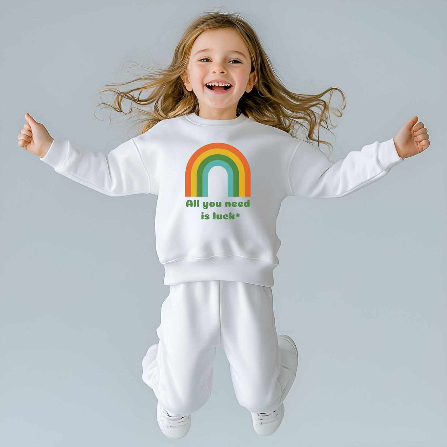 Image: All You Need is Luck St Patricks Day Sweatshirt for Toddlers Girls and Tweens. This crewneck pullover features a retro rainbow, the text All You Need is Luck and a four leaf clover. Available in white, black and gray, by jaecrece