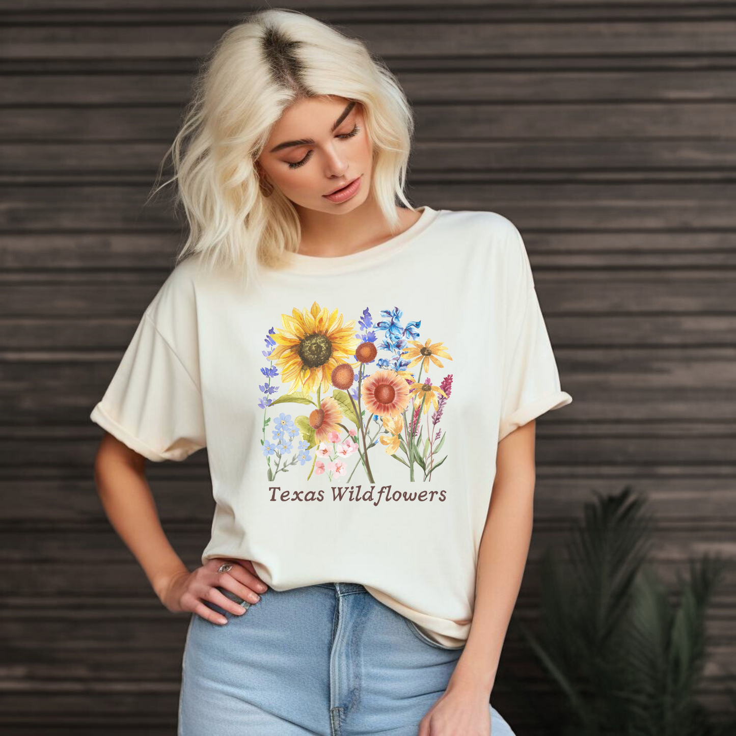 Spring in Texas graphic T-shirt featuring colorful bluebonnets and wildflowers printed on a Comfort Colors 1717 unisex tee. This soft, breathable shirt is designed for flower lovers, Texas pride, and road tripping through Hill Country. Great for women who love wildflower season, soft girl fashion, or boho floral outfits. Perfect for festivals, photography days, or everyday wear with a touch of Southern charm.