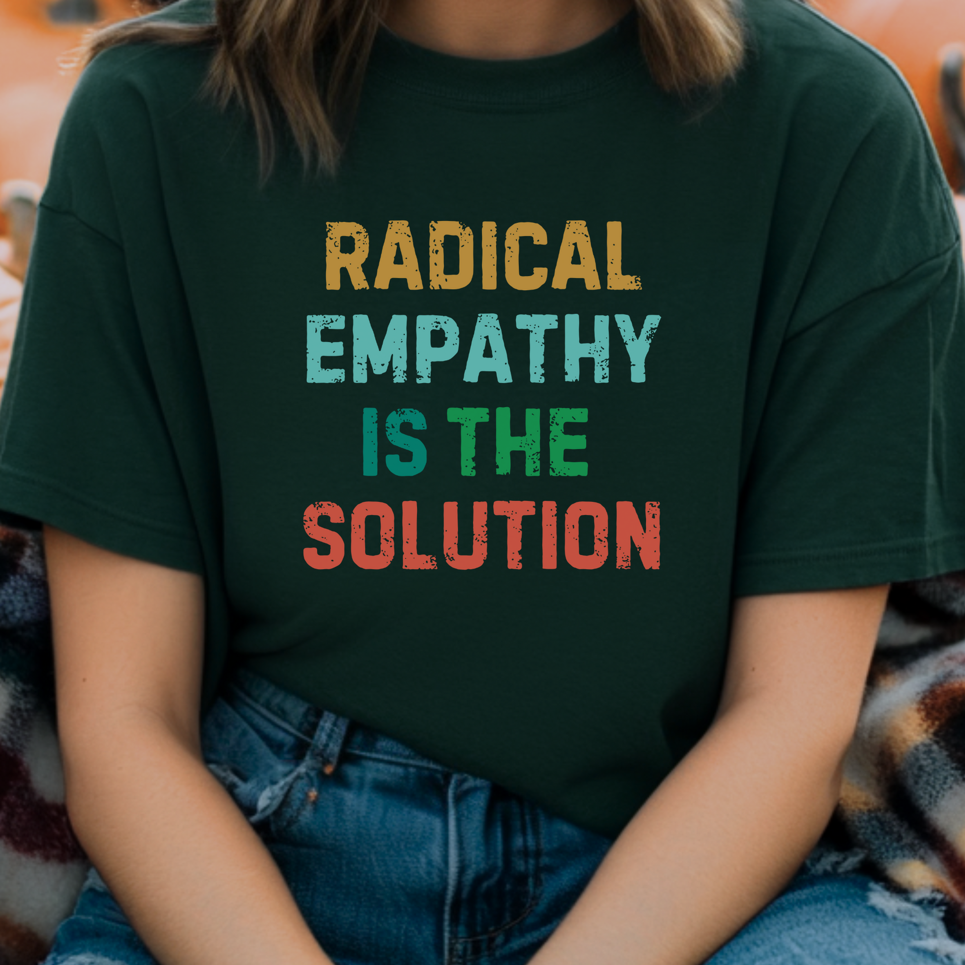 Image: Make a statement with this bold "Radical Empathy is the Solution" t-shirt, a must-have for activists and progressive thinkers. This unisex tee is perfect for rallies, protests, or everyday wear, ensuring your values are seen and heard. Whether you support mental health awareness, neurodiversity, or feminist causes, this inclusion shirt is a great way to share your message, by jaecrece.