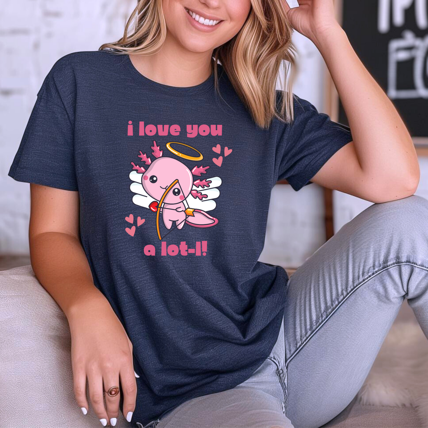 Celebrate love with this “I Love You A Lot-L” axolotl Valentine’s shirt for women. Featuring a pink axolotl cupid with playful hearts, this Bella Canvas 3001 tee combines comfort and style in sizes XS–XL. Ideal for quirky Valentine’s Day outfits, teachers, animal lovers, and women who love cute graphic tees. Perfect for date night, classroom celebrations, or as a fun Valentine’s gift for girlfriends, wives, and axolotl enthusiasts.