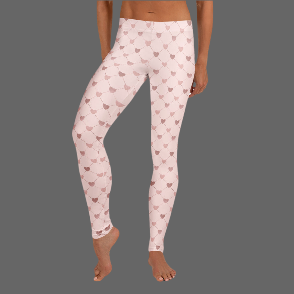 Image: Pale Pink Leggings with dainty heart accents. Available in sizes for toddler girls, teens, tweens and women. Perfect for Valentines day, or any family matching activity, by jaecrece