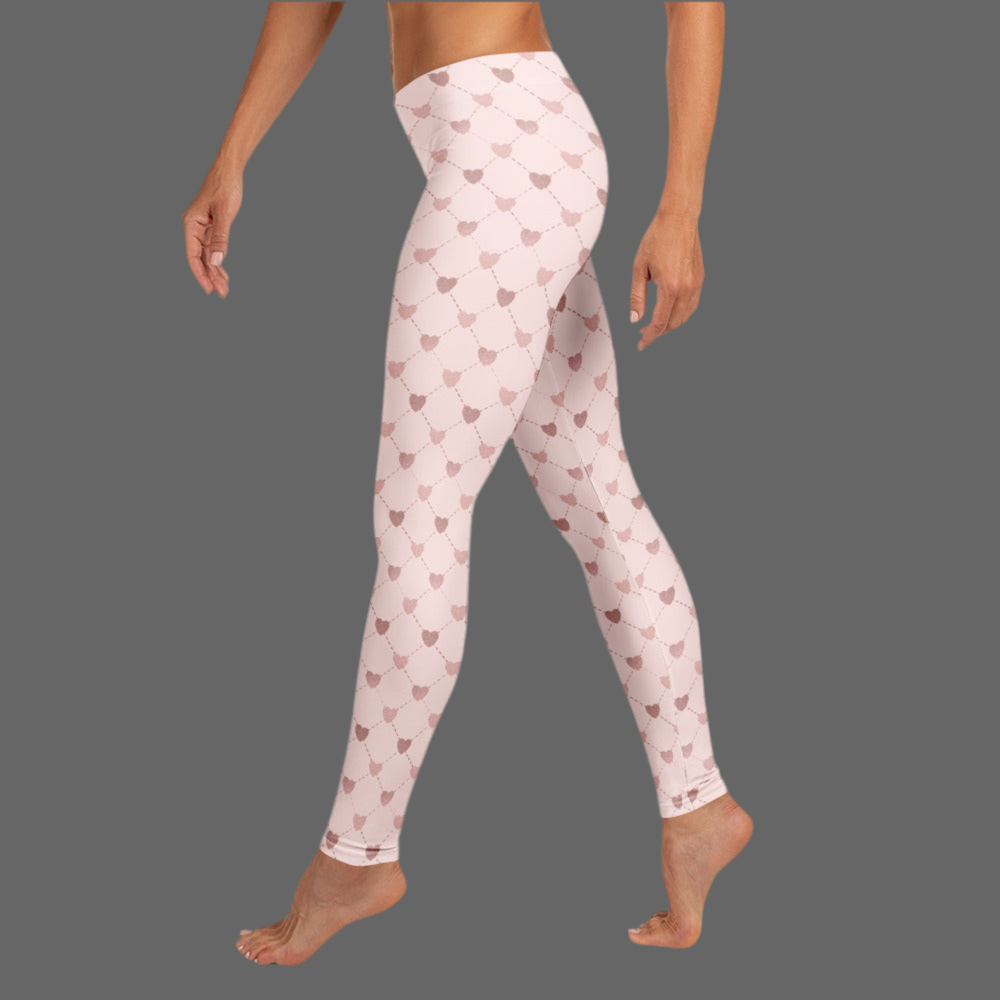 Image: Pale Pink Leggings with dainty heart accents. Available in sizes for toddler girls, teens, tweens and women. Perfect for Valentines day, or any family matching activity, by jaecrece