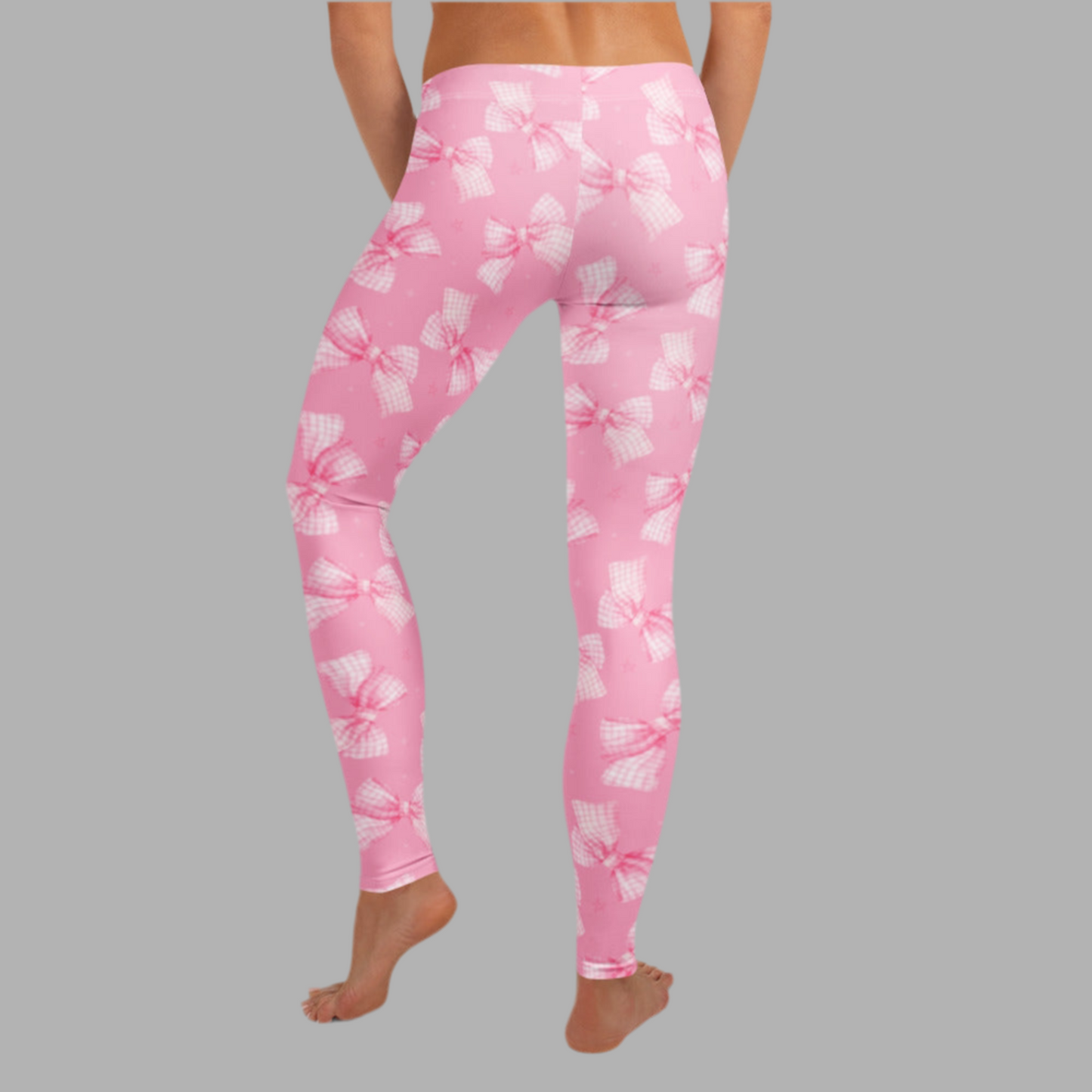 Image: Coquette bow leggings for women in light pink with tiny bows. Designed for comfort and cuteness, this piece offers a stylish option for women who love soft colors and playful prints. Great for gifting, everyday wear, or coordinating with a matching child’s pair, by jaecrece.