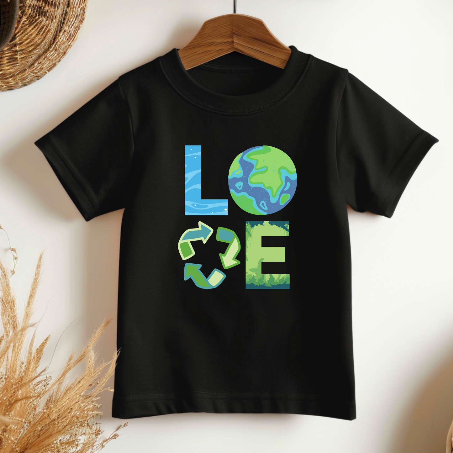 Image: A Love Earth Day shirt designed for babies and toddlers, featuring bold letters that each symbolize an element of nature. The L resembles flowing water, the O is designed as the Earth, the V represents the reduce reuse recycle symbol, and the E is shaped like plants and trees. This eco friendly tee is perfect for Earth Day celebrations, environmental events, and spreading awareness about sustainability and conservation, by jaecrece.