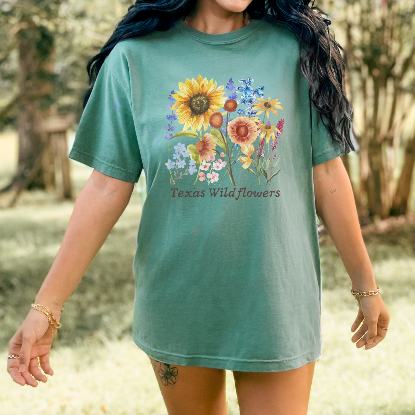 Texas Wildflowers T-shirt featuring hand-drawn bluebonnets, Indian paintbrush, and golden coreopsis. This soft Comfort Colors 1717 tee captures the beauty of spring in Texas with a cottagecore, soft girl aesthetic. Ideal for wildflower road trips, festivals, or gifting to Texas natives. A cute floral shirt for nature lovers and Southern girls who adore Texas blooms and scenic Hill Country drives.