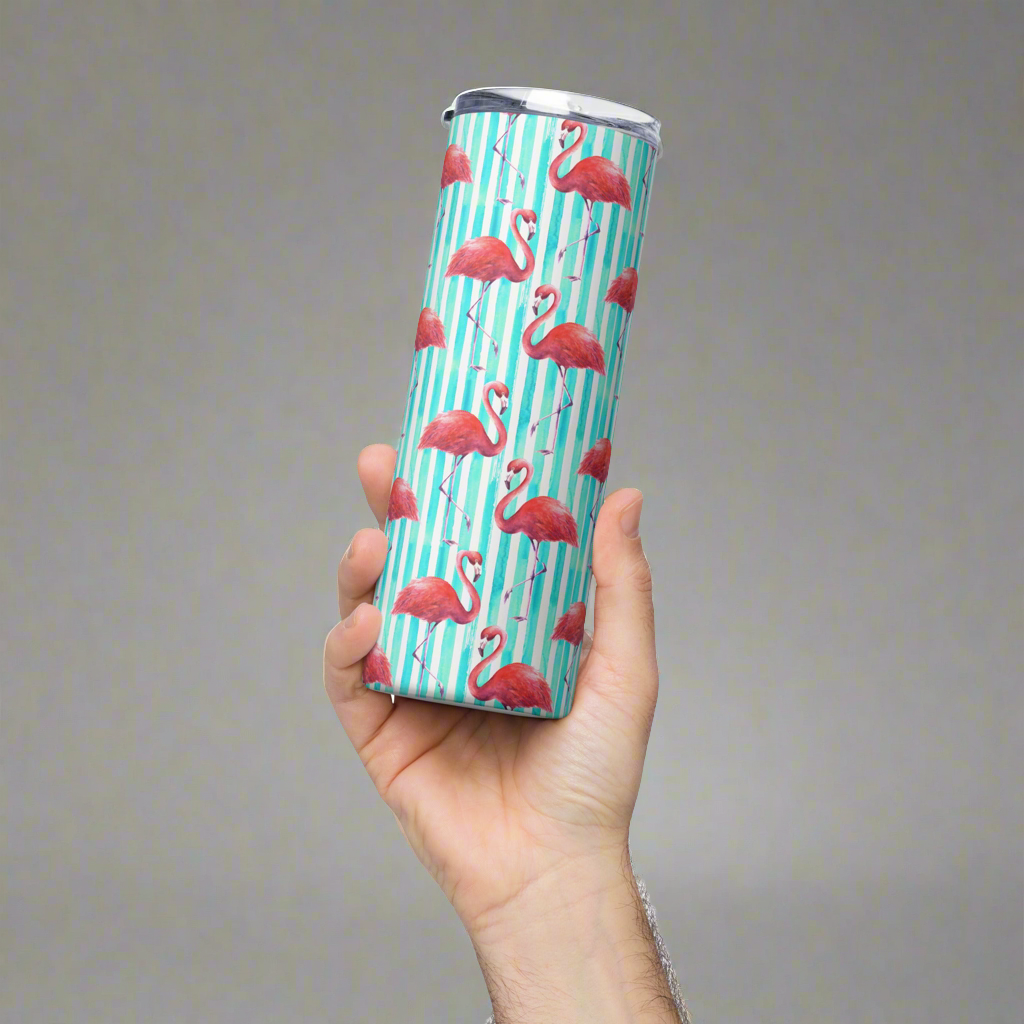 20 oz flamingo stainless tumbler with bright pink tropical theme, made for pool days and road trips. Reusable, eco-friendly tumbler includes secure lid and straw. Ideal for iced coffee, smoothies, or water on the go. A fun, stylish choice for flamingo lovers, summer birthday gifts, and coastal drinkware fans. Great addition to your summer essentials.