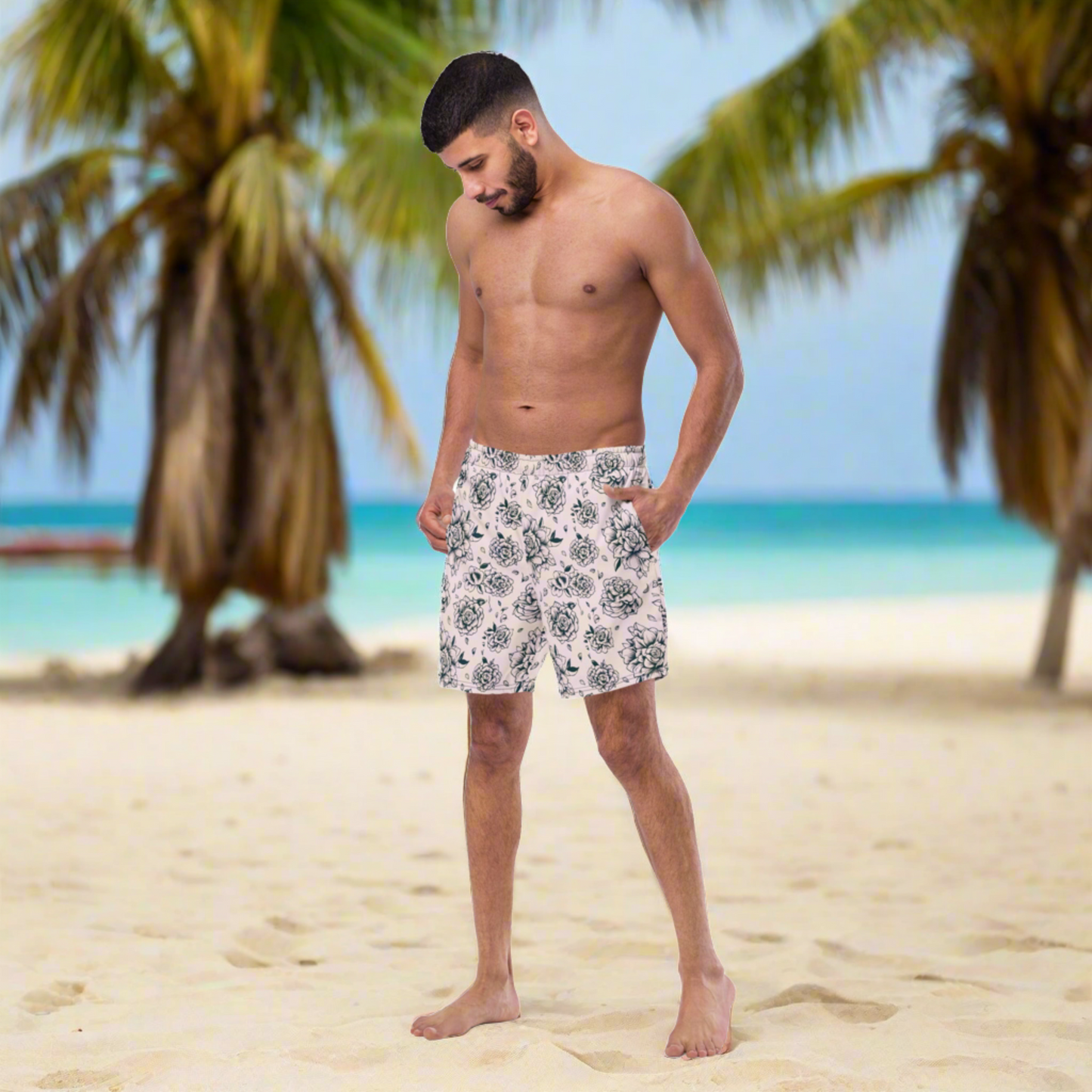 Bold and stylish Pink Tattoo Roses Swim Trunks for men, made from 91% recycled polyester for sustainable fashion. These trunks feature an edgy black rose design, anti-chafe mesh liner, drawstring waistband, and UPF 50+ protection. Perfect for dads wanting to match with the family, or anyone seeking unique summer swimwear. Ideal for beach days, resort getaways, or pool parties with a bold, fashion-forward twist.