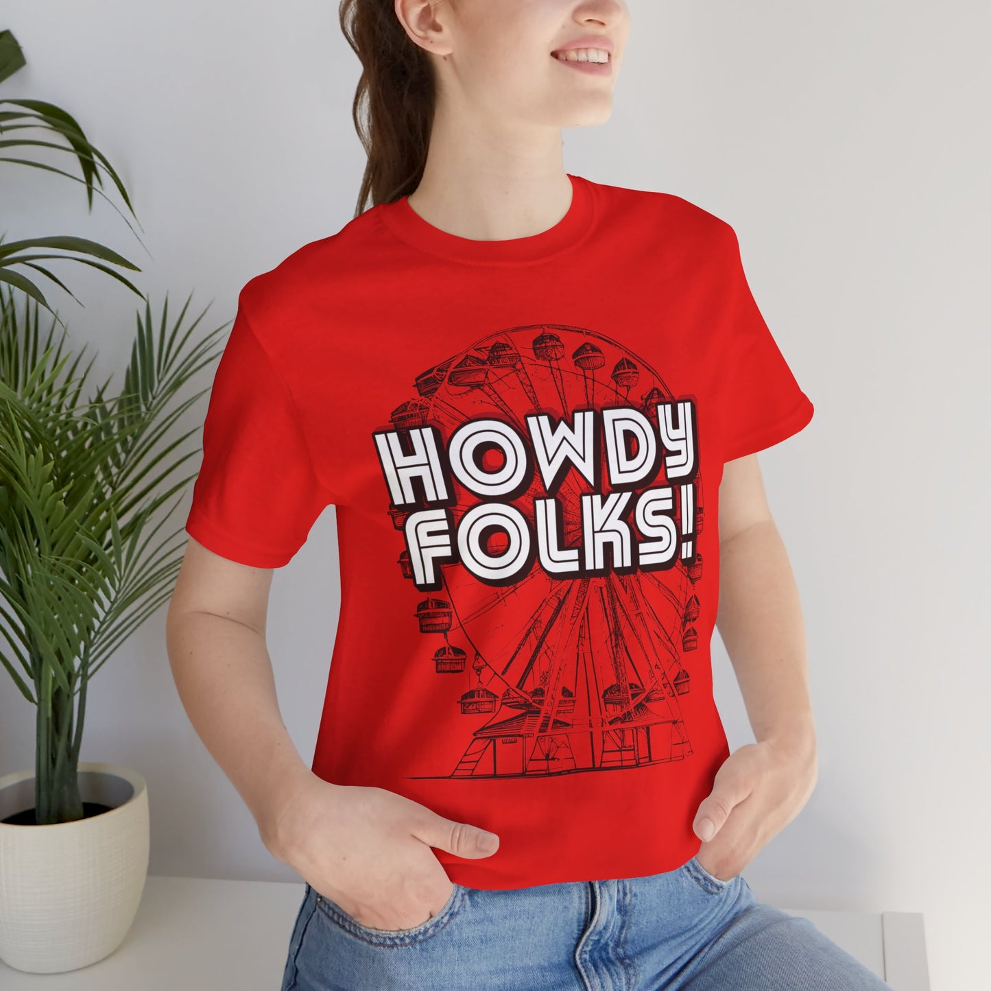 State Fair of TEXAS "Howdy Folks!'  adult shirt. This unisex tee features a retro graphic of a ferris wheel with the words Howdy Folks in large block letters. by jaecrece