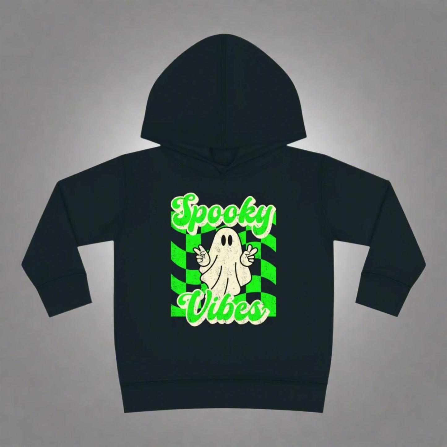 Spooky Vibes Halloween Toddler Hoodie. Featuring a green checkerboard design with a cute ghost giving peace signs, with the text spooky vibes. Mommy and Me/ Family Matching options, by jaecrece