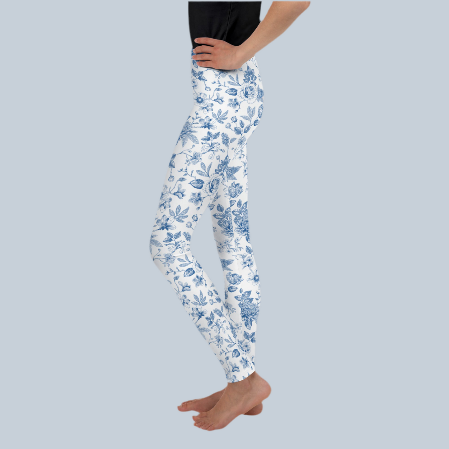 Image: Classic blue toile youth leggings for girls in sizes 8 to 20, perfect for everyday wear, seasonal photos, or matching family outfits. These leggings blend comfort and vintage style with a beautiful floral pattern inspired by timeless French toile design. A must-have wardrobe staple for stylish tweens and teens who love cozy, fashion-forward outfits with charm, by jaecrece.