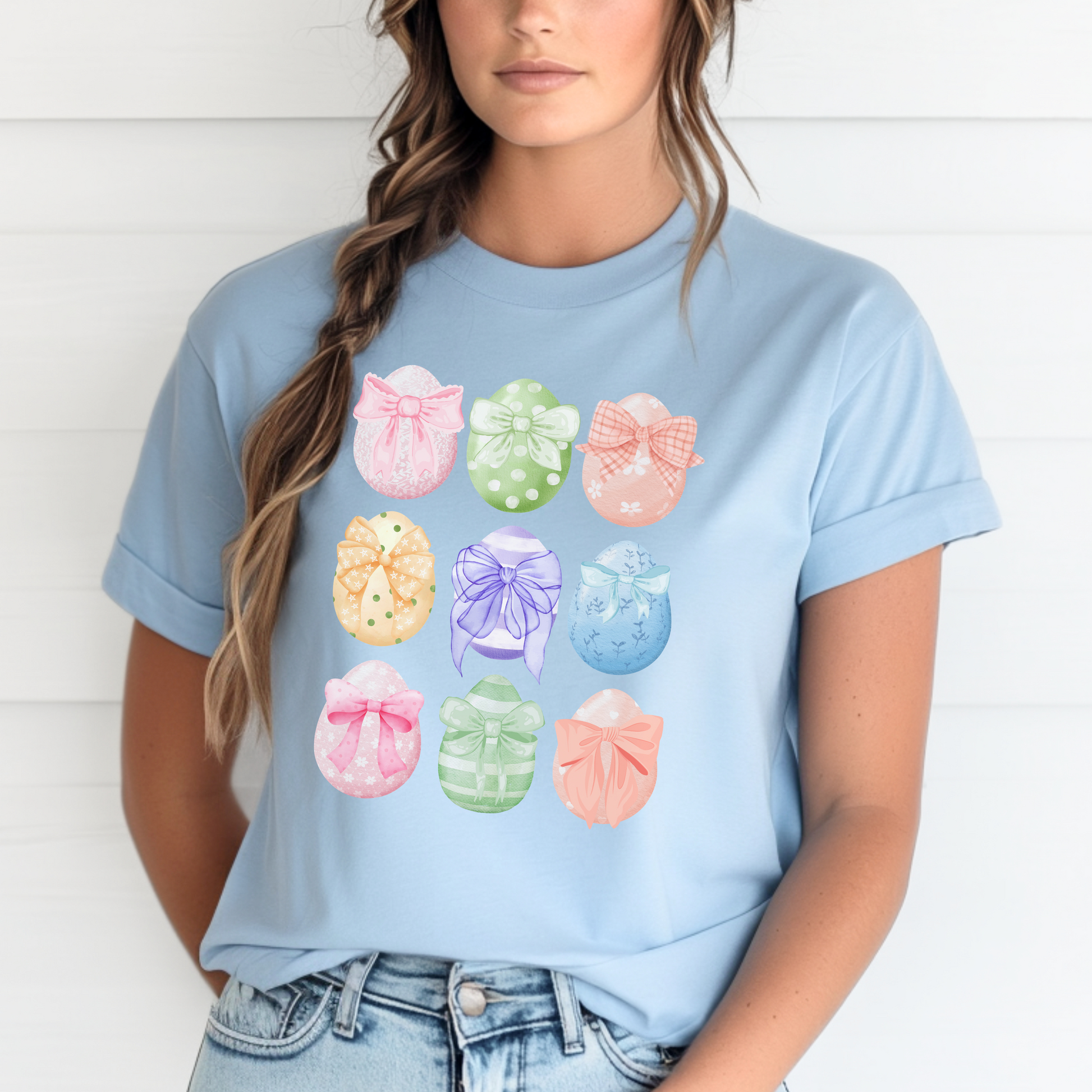 Image: Easter egg tshirt with coquette bows for women. This tee makes a great Easter basket gift, or the perfect outfit for Easter celebrations, by jaecrece