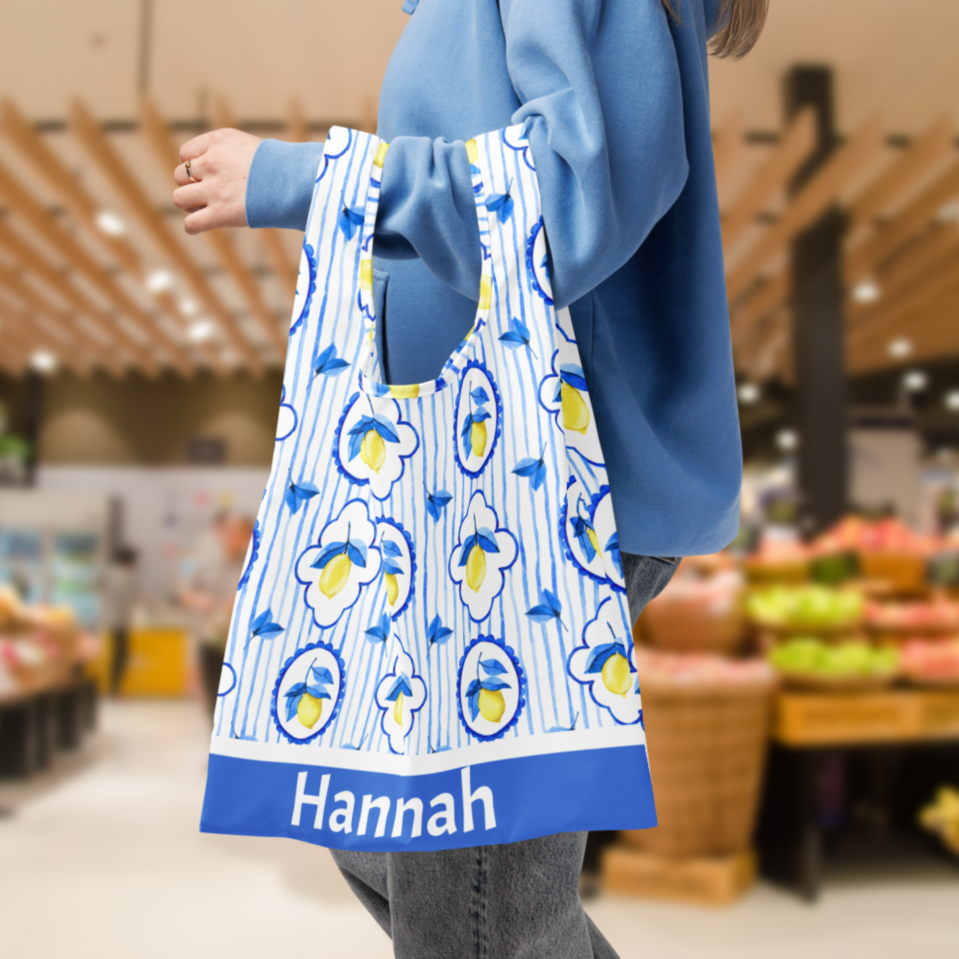 Chic Amalfi Lemon Tote Bag inspired by the Italian coast, perfect for beach days, shopping trips, or farmers markets. Lightweight yet durable, this eco friendly travel tote bag folds up neatly with an elastic strap, making it easy to carry in a purse or suitcase. Great as an Italian summer tote, Positano beach bag, or grocery tote. Dimensions: 15.3" × 15.7", ideal size for everyday essentials, Italy vacation, or gifting.