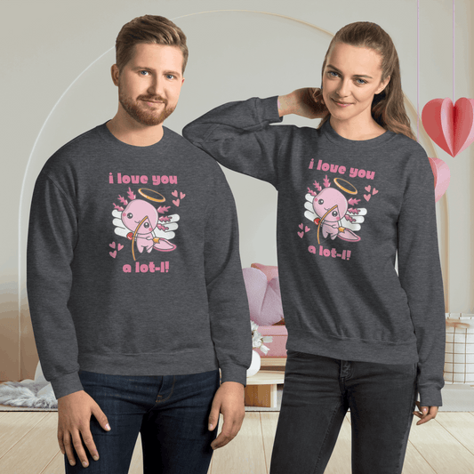 A smiling man and woman wearing matching Valentine’s Day sweatshirts featuring a cute axolotl cupid design with wings, halo, hearts, and the phrase I love you a lot l. The unisex crewneck sweatshirts have a relaxed classic fit, making them ideal for couples outfits, casual winter wear, and cozy date nights. This playful animal themed Valentine sweatshirt is perfect for couples gifts, family matching looks, and fun seasonal photos.