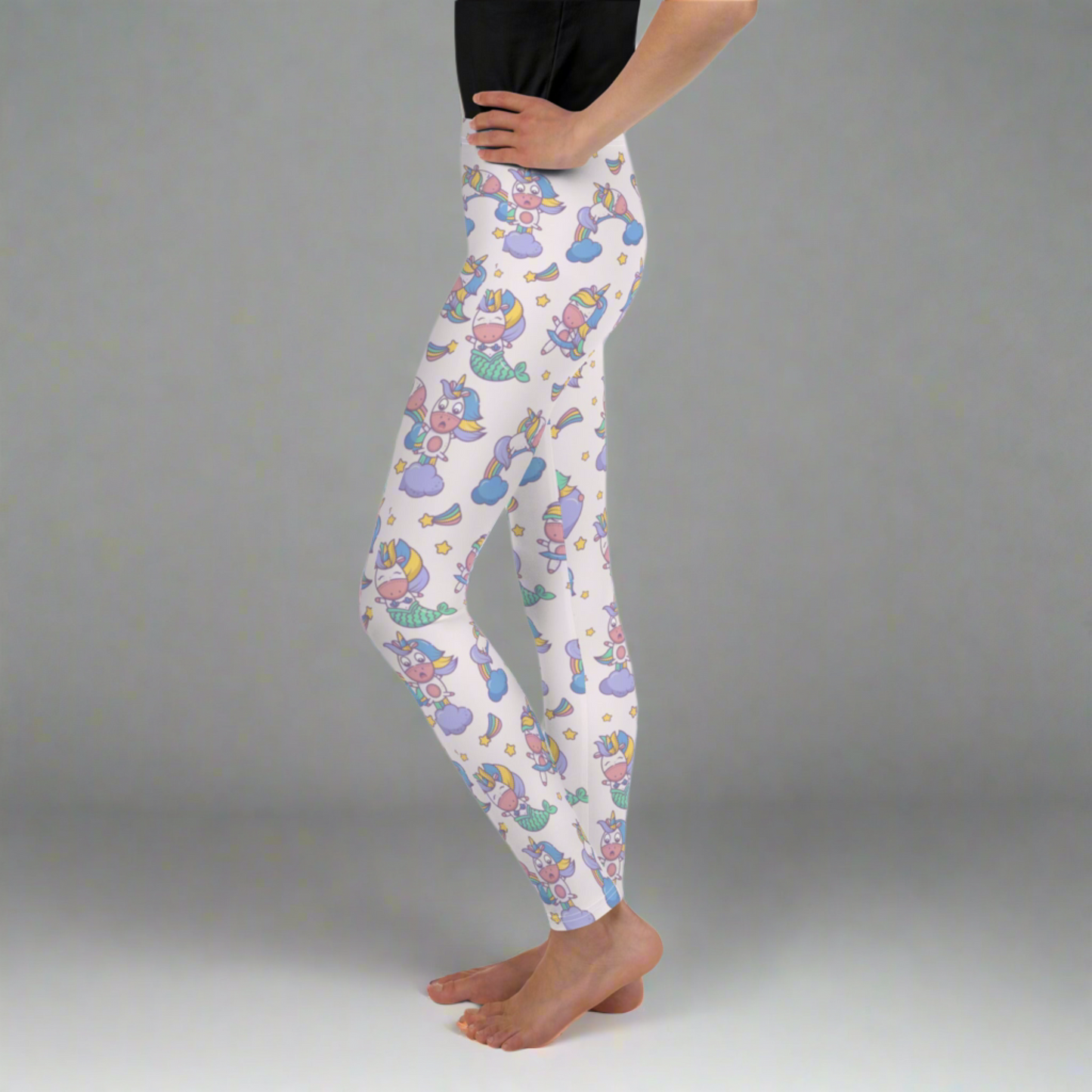 Image: Unicorn Mermaid Kawaii Girls Leggings. These pastel pink yoga pants feature a cute pattern graphic of Unicorn mermaids, stars and rainbows. The perfect birthday present, Christmas gift, school outfit for toddlers, tweens and teens, by jaecrece