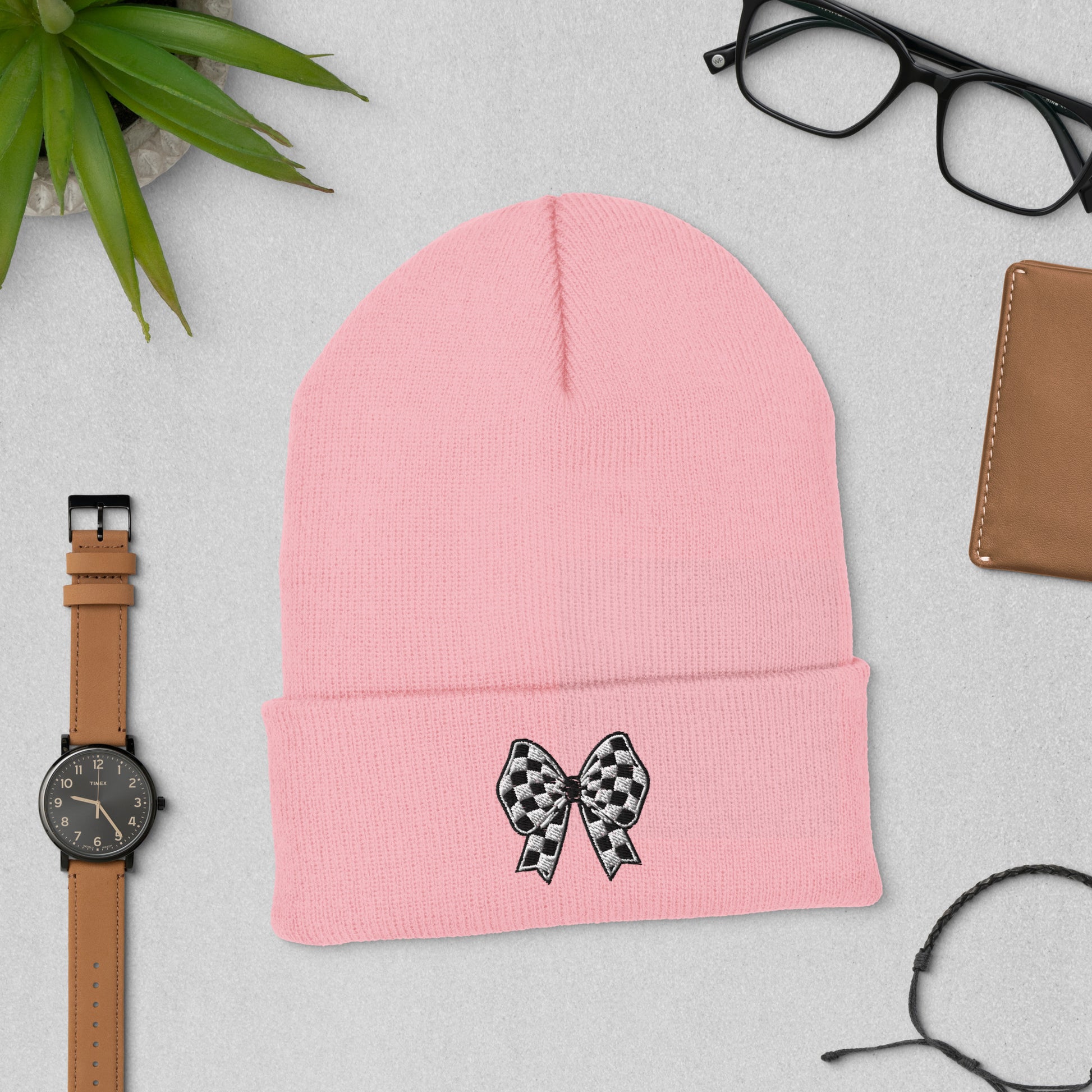 This Coquette Checkerboard Bow Beanie is thoughtfully made to order, reducing waste while offering high-quality comfort. Featuring an embroidered checkered bow and crafted from hypoallergenic Turbo Acrylic, it’s both eco-conscious and durable. The cozy knit design and soft girl aesthetic make it ideal for conscious shoppers who love pretty, practical winter accessories. Available in multiple colors, it’s a mindful choice that blends style and sustainability.