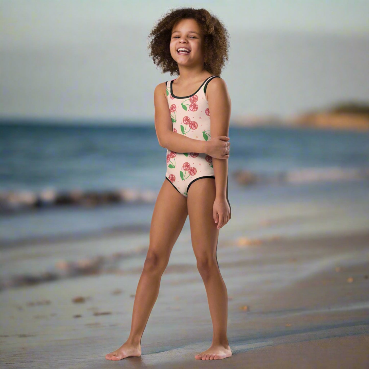 Image: Disco Cherries Kids One Piece Swimsuit n sizes 2T-7, This fruit inspired swimsuit is a part of our Family Matching Swimwear Collection, and features a pink background with red disco ball cherries and stars, by jaecrece